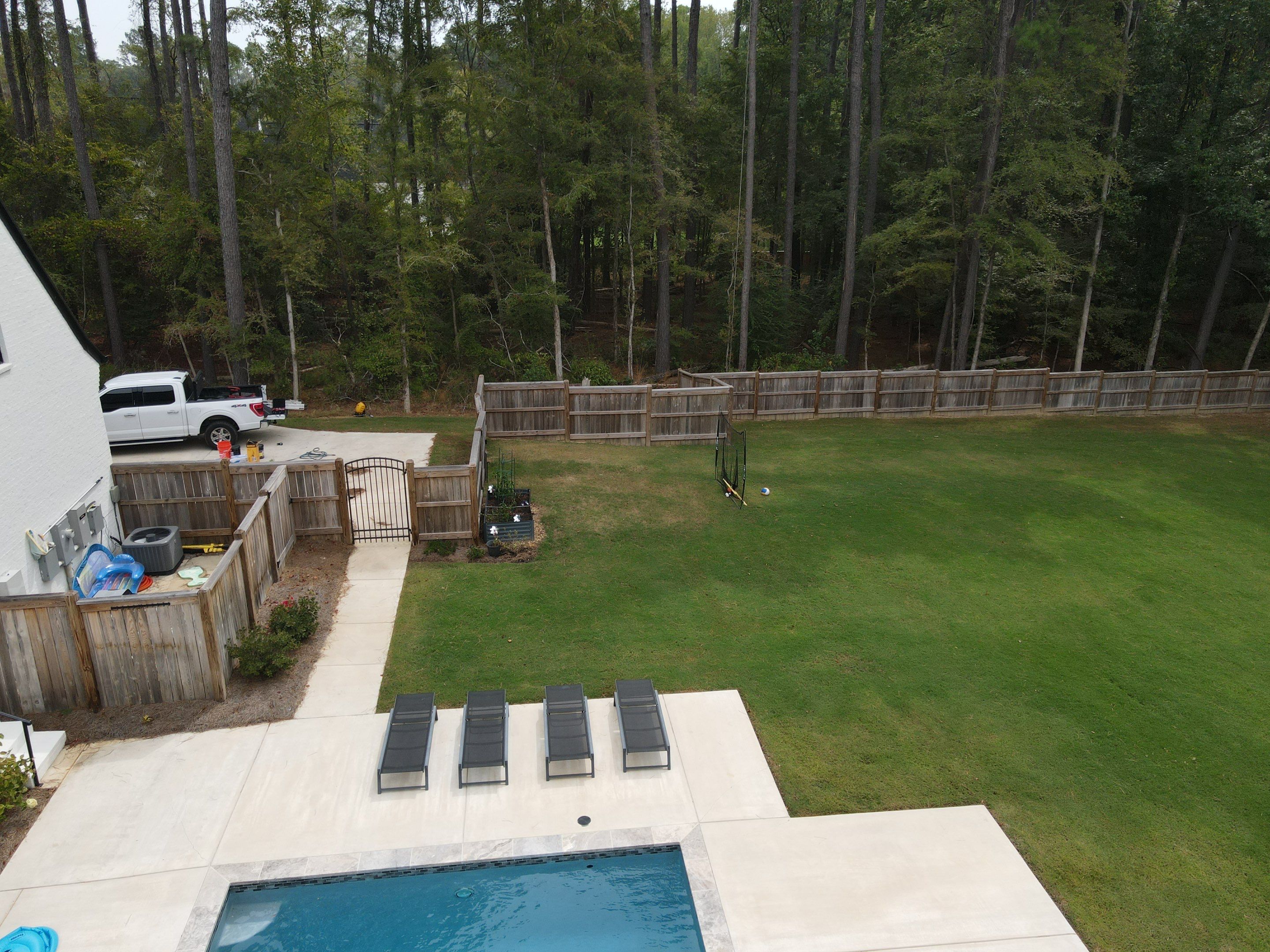 Fence Stain using Wood Defender Black  by Roberson Construction LLC