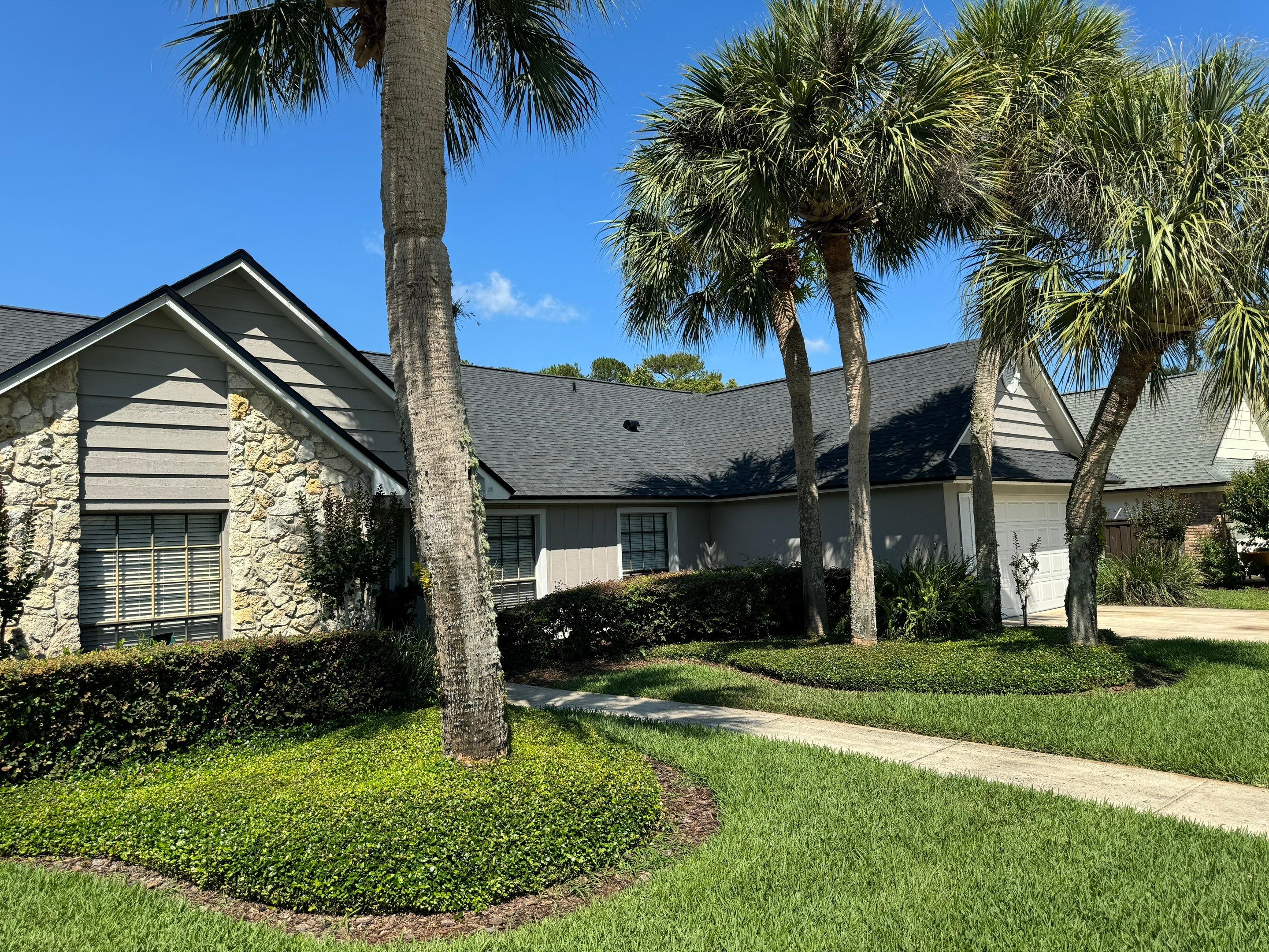 Asphalt Architectural Shingle Roof Replacement and Solar Integration in Longwood by Fortified Roofing Solutions Corp.