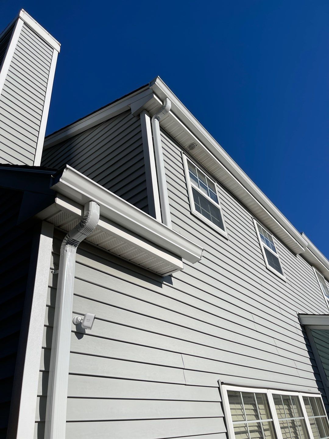 Gutter Installation using White gutters by A Plus Exterior