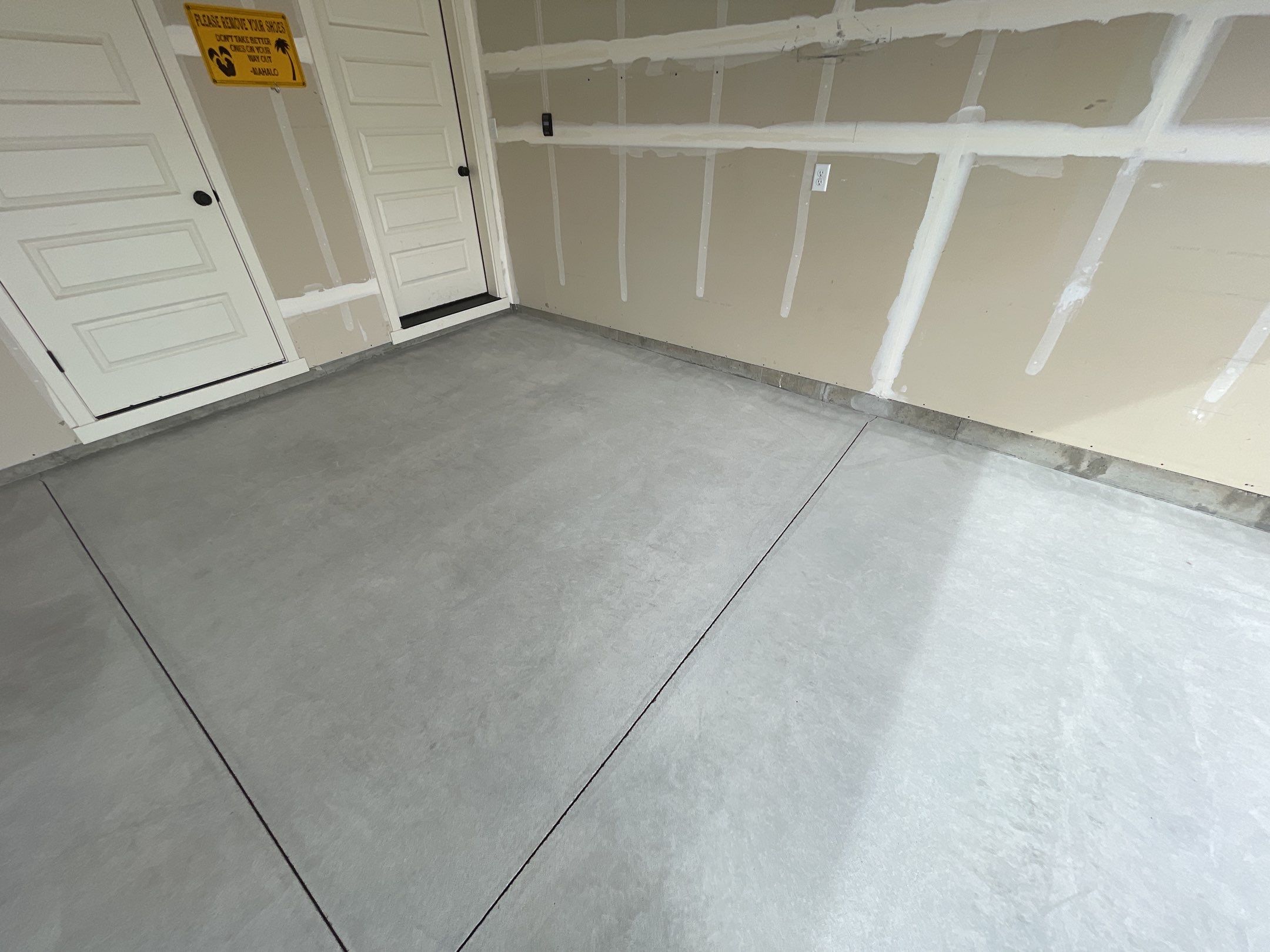 Garage Transformation using Domino by Croc Coatings, LLC