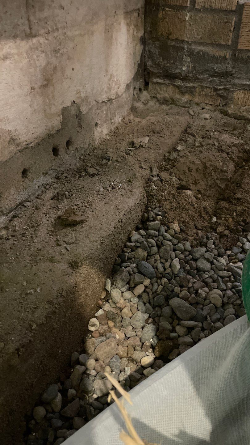 Extending the Drain Tile System for Igor by Waterproofing Northeast
