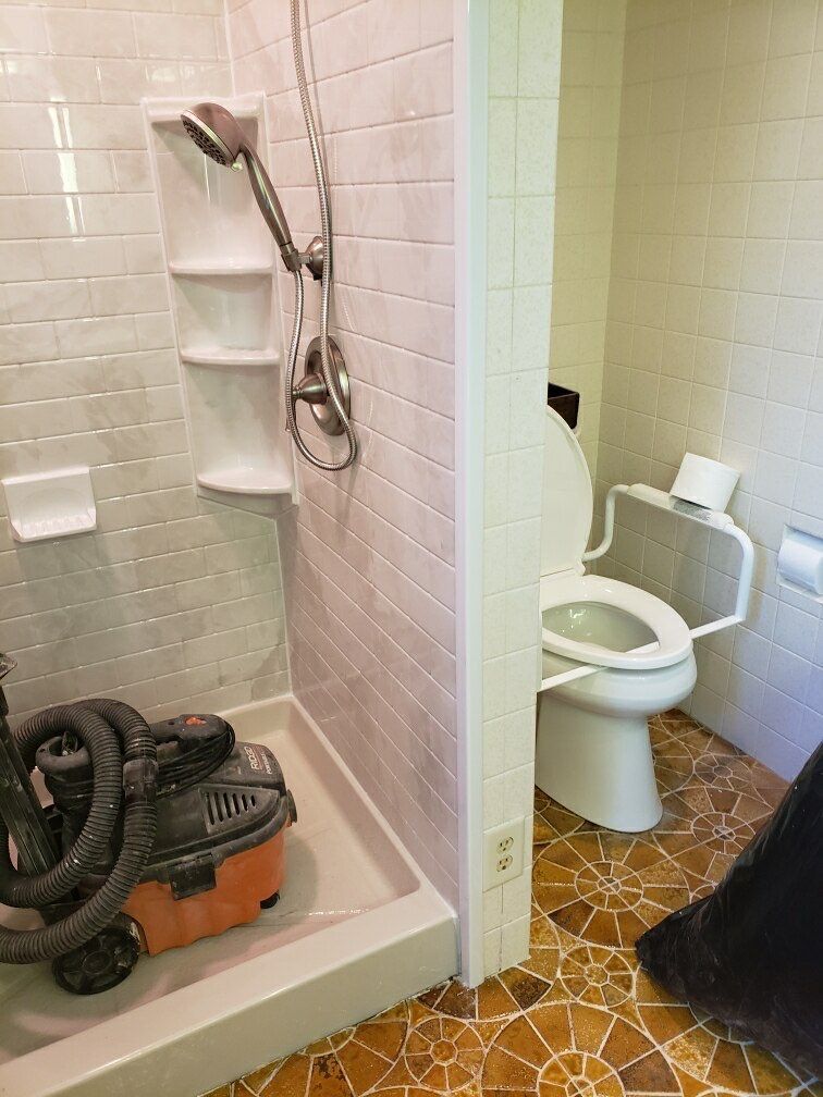 Shower Replacement using BCI Acrylic Shower System by Secure Construction Company Inc