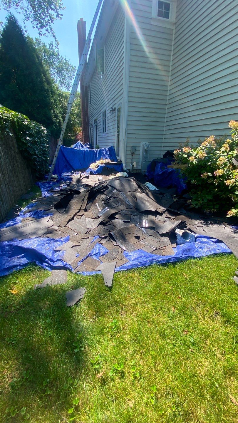 Asphalt Roof Replacement by Custom Installations