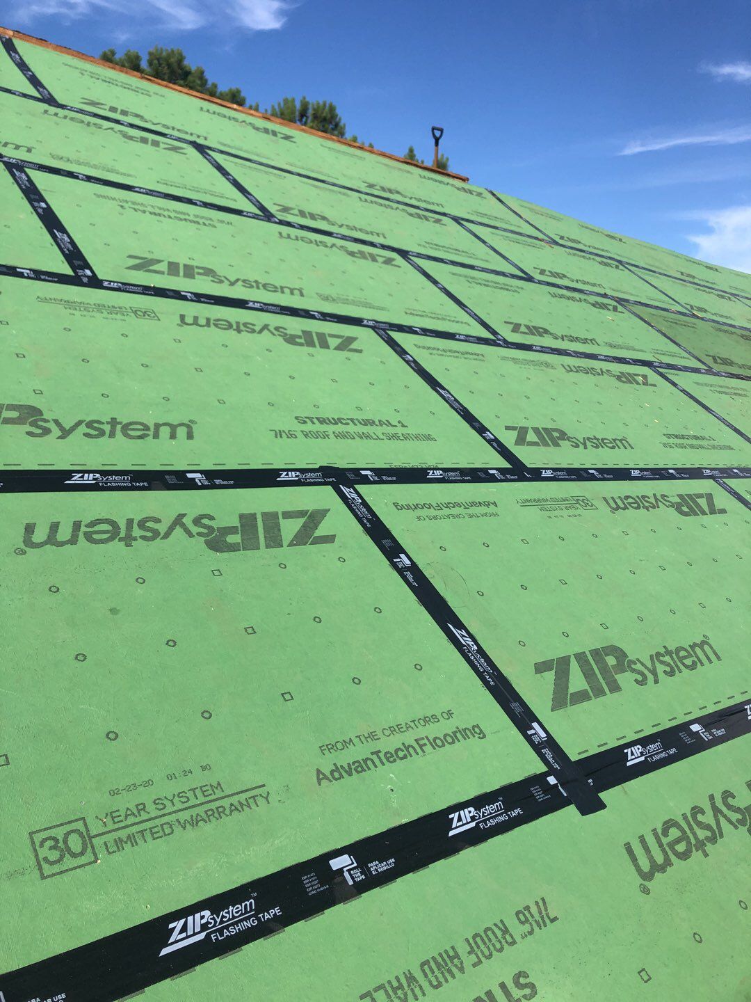 Designer Residential Roof with Zip System by Springtree Restoration