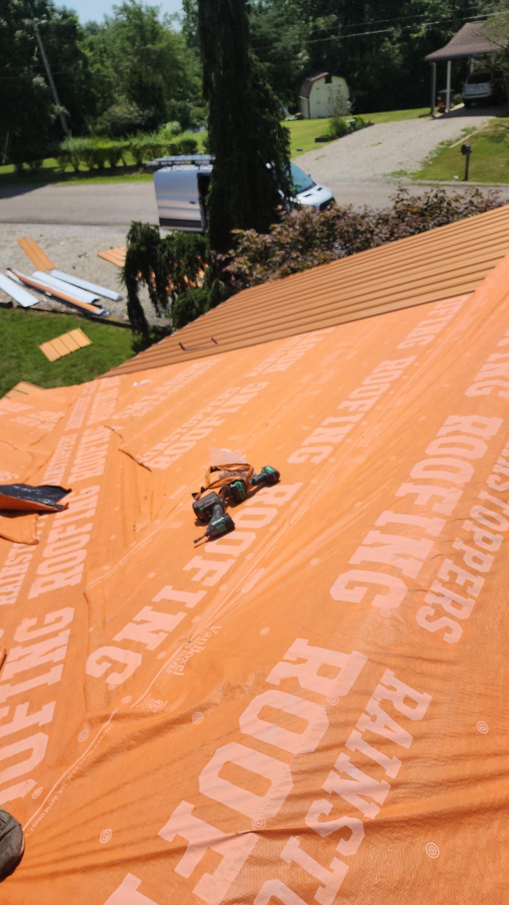 Residential Roofing Installation using Metal by Rainstoppers Roofing