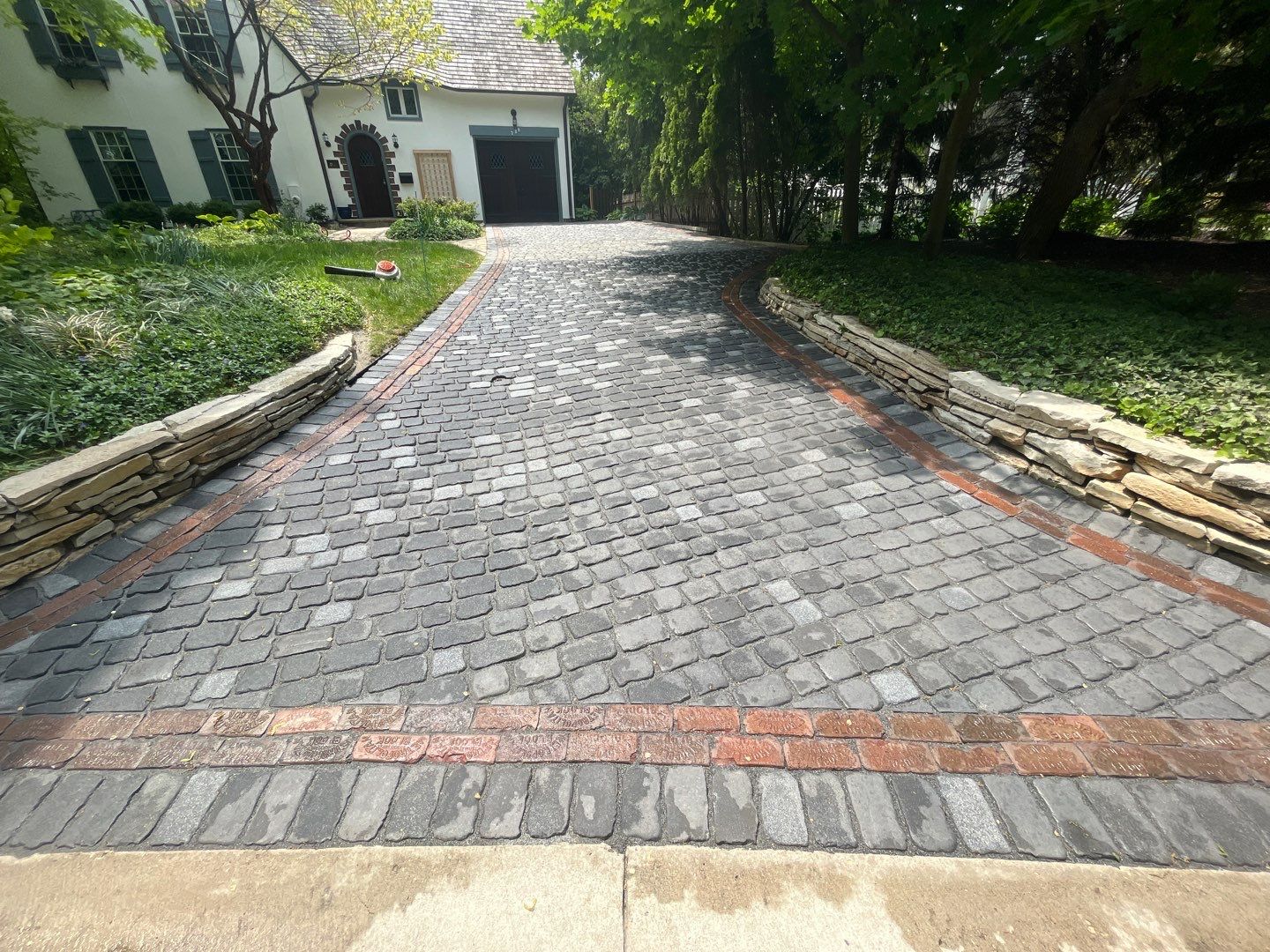 Glencoe, IL brick paver clean sand seal, repair, and reseal by Northern Power Washing LLC.