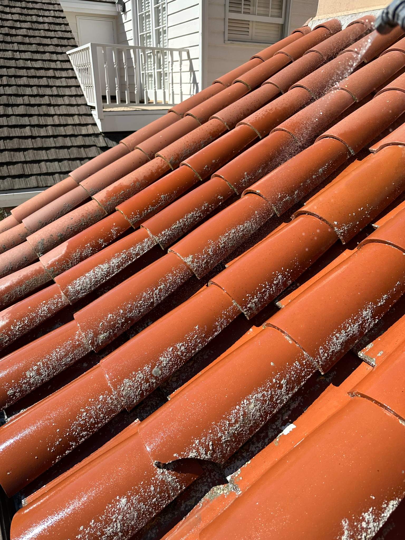 Orange County Clay Tile Roof Soft Wash on Unwalkwable Roof by Property Cleaning Experts