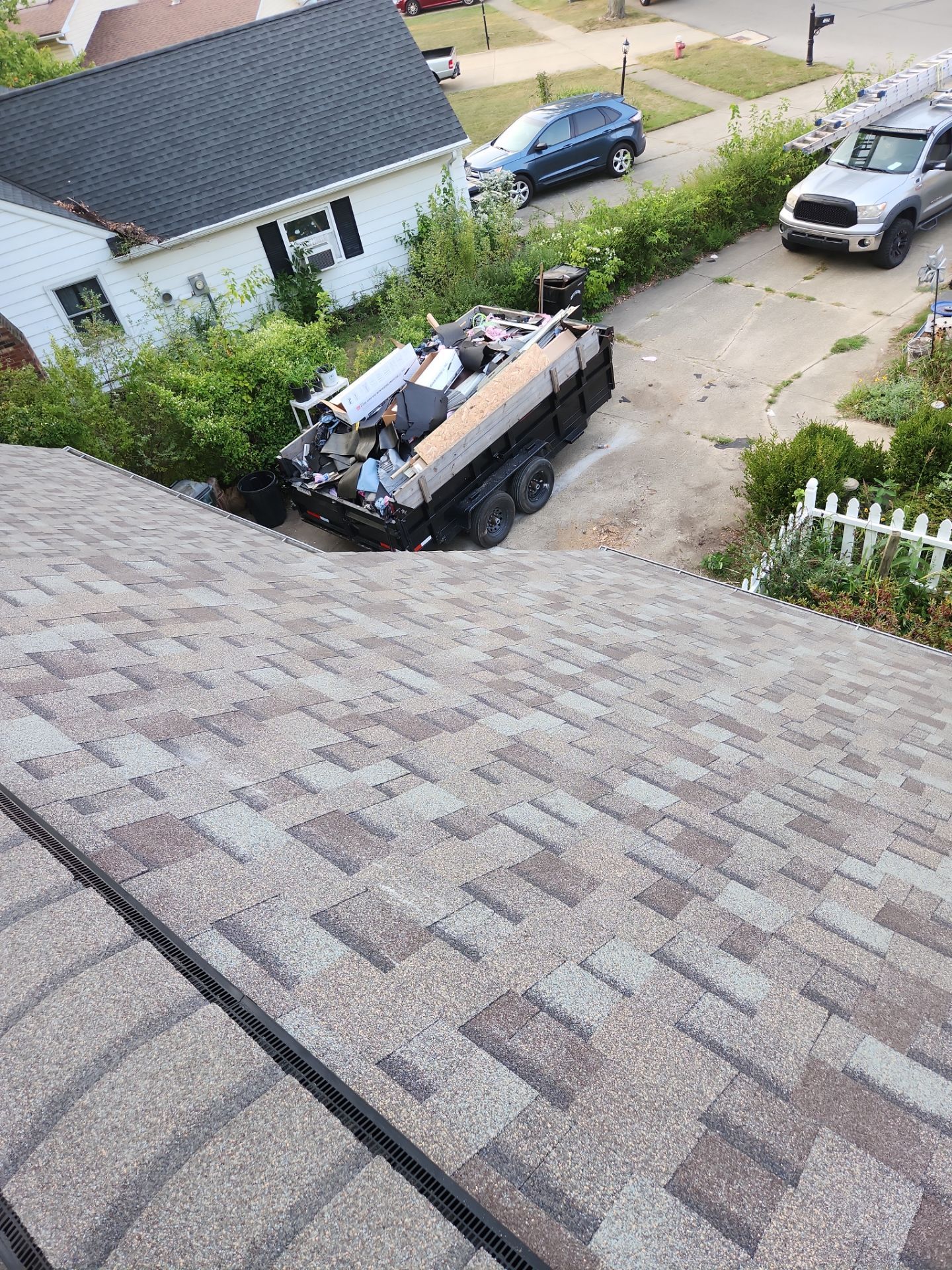 Residential Roof Replacement using Owens Corning Duration Driftwood by Absolute Roofing and Construction