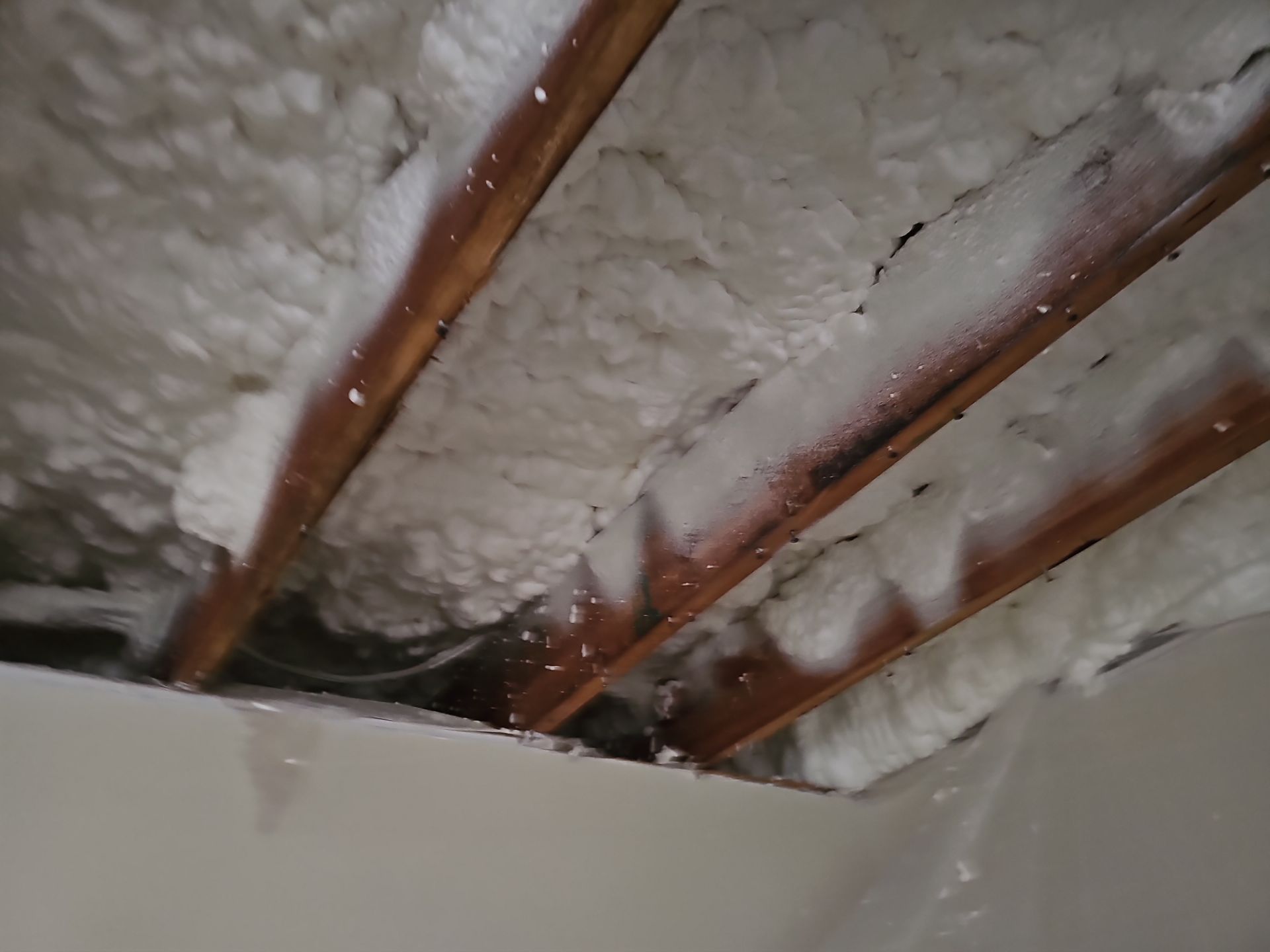 Attic Insulation using open cell spray foam by NYS Foam & Energy
