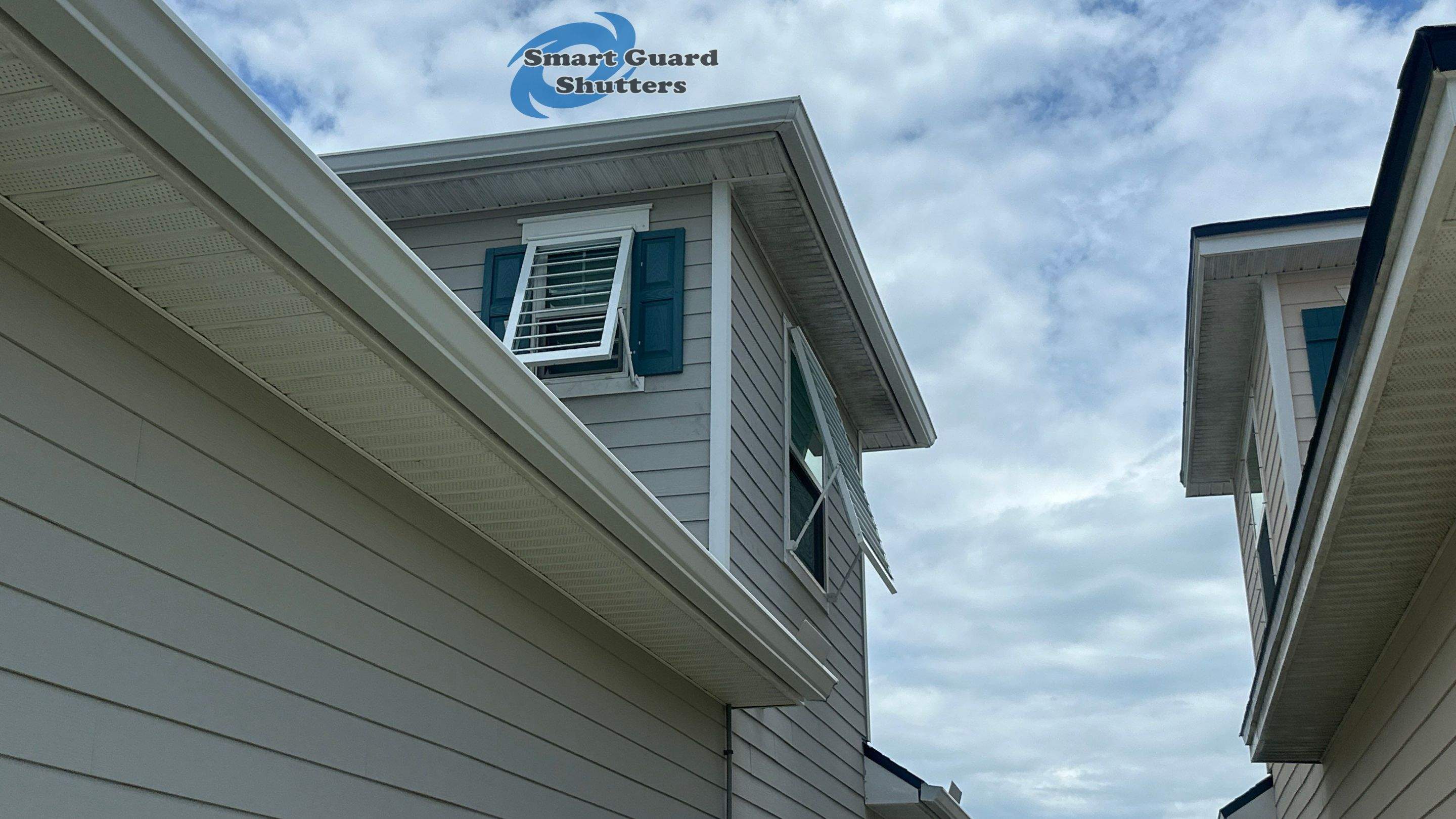 Impact Bahama Shutters in Signal White by Smart Guard Shutters