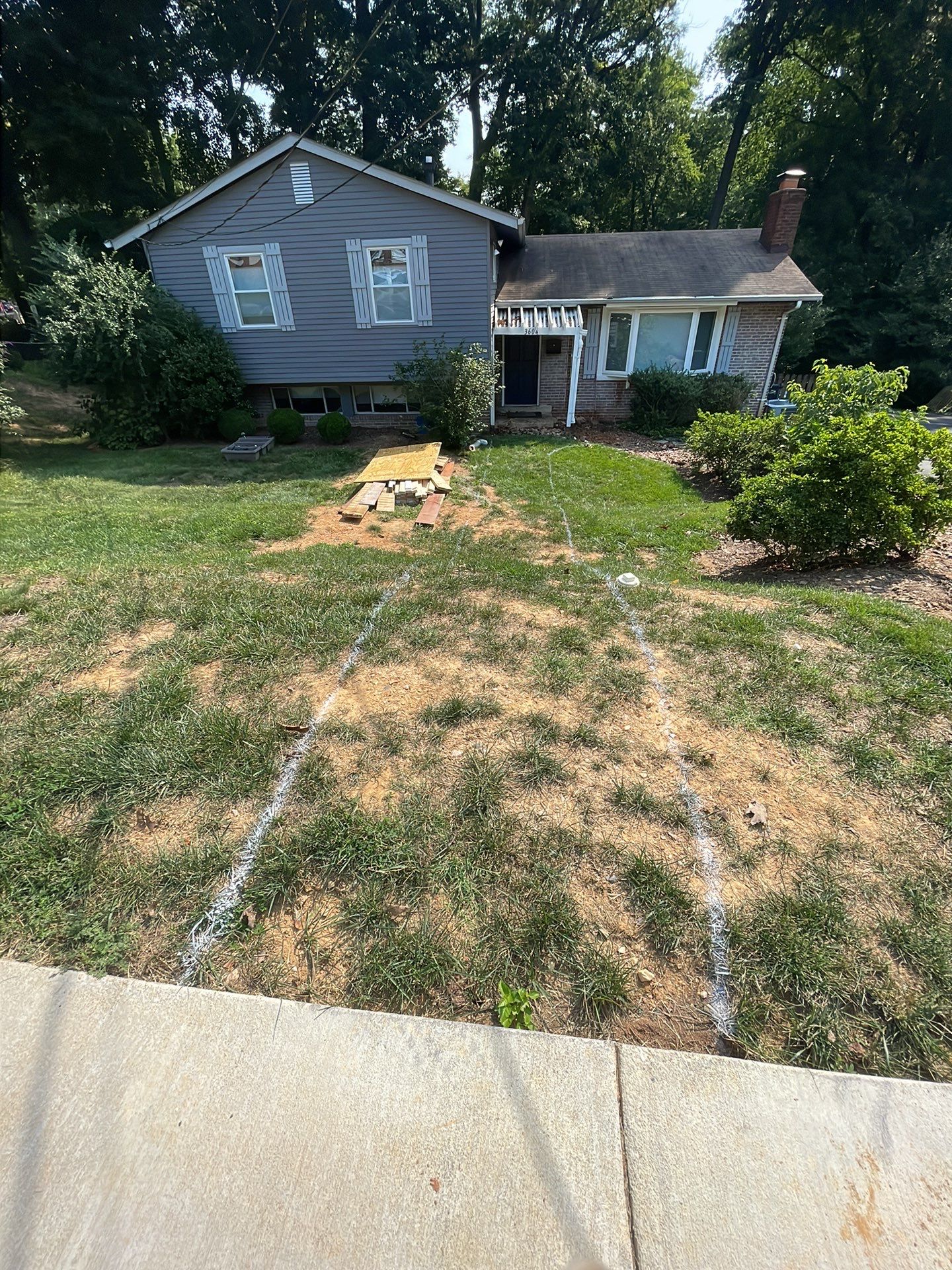 New walkway with stairs and a new front porch by Fairfax Contractors, LLC