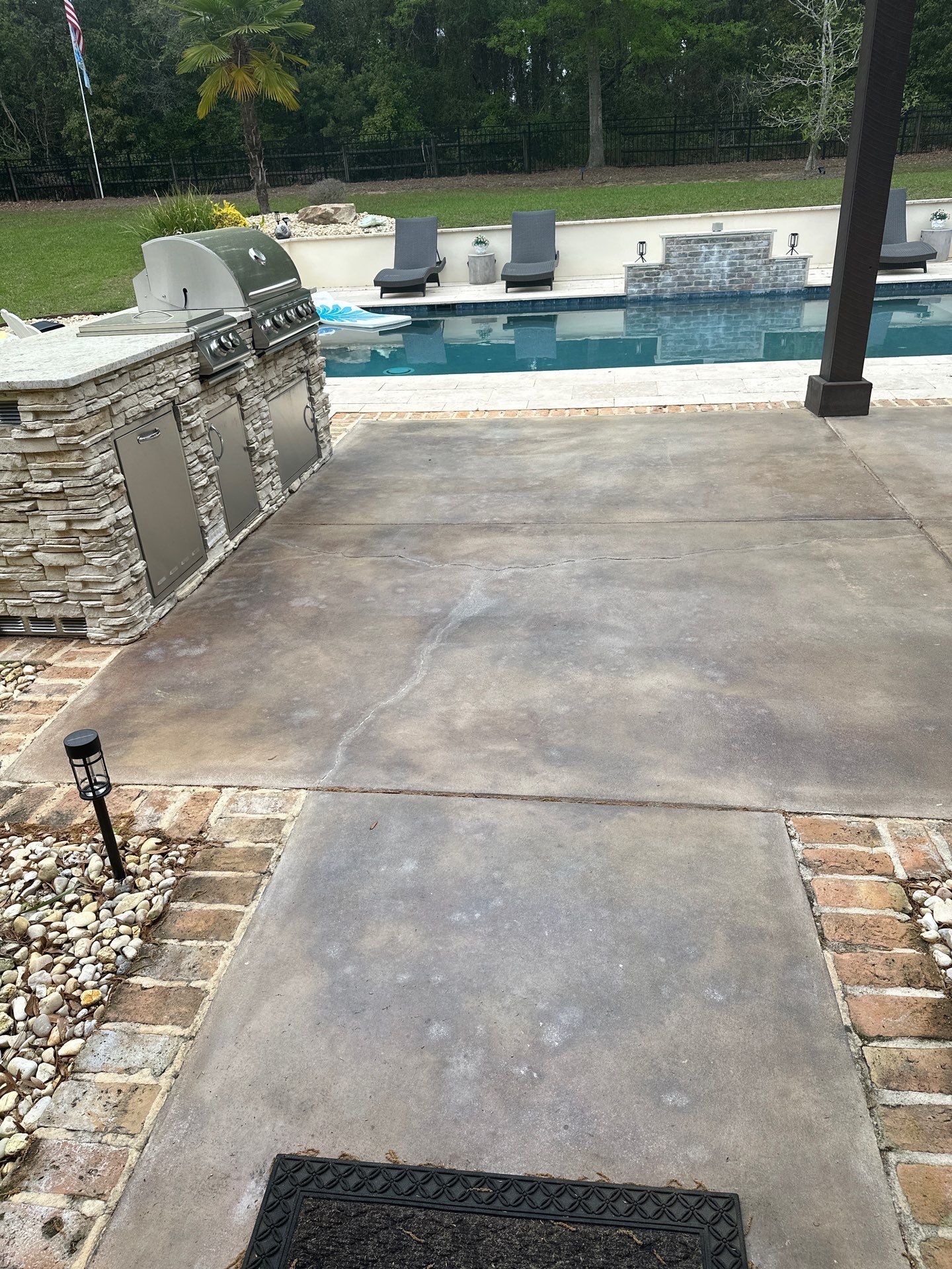 Decorative Flagstone Concrete Overlay for Fairhope Patio by Cornerstone Hard Surface Restoration