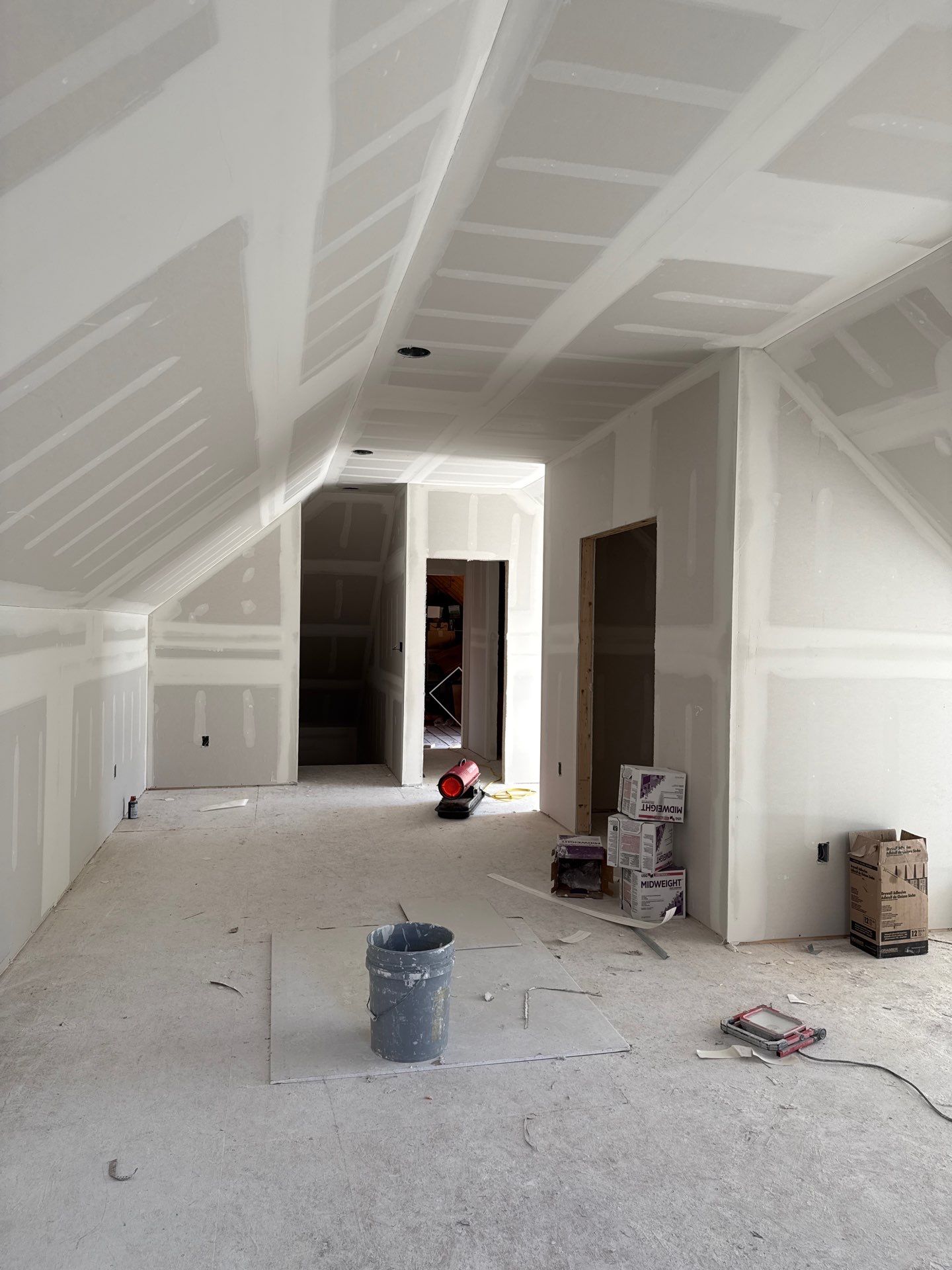 Attic Conversion by Skilled Construction LLC