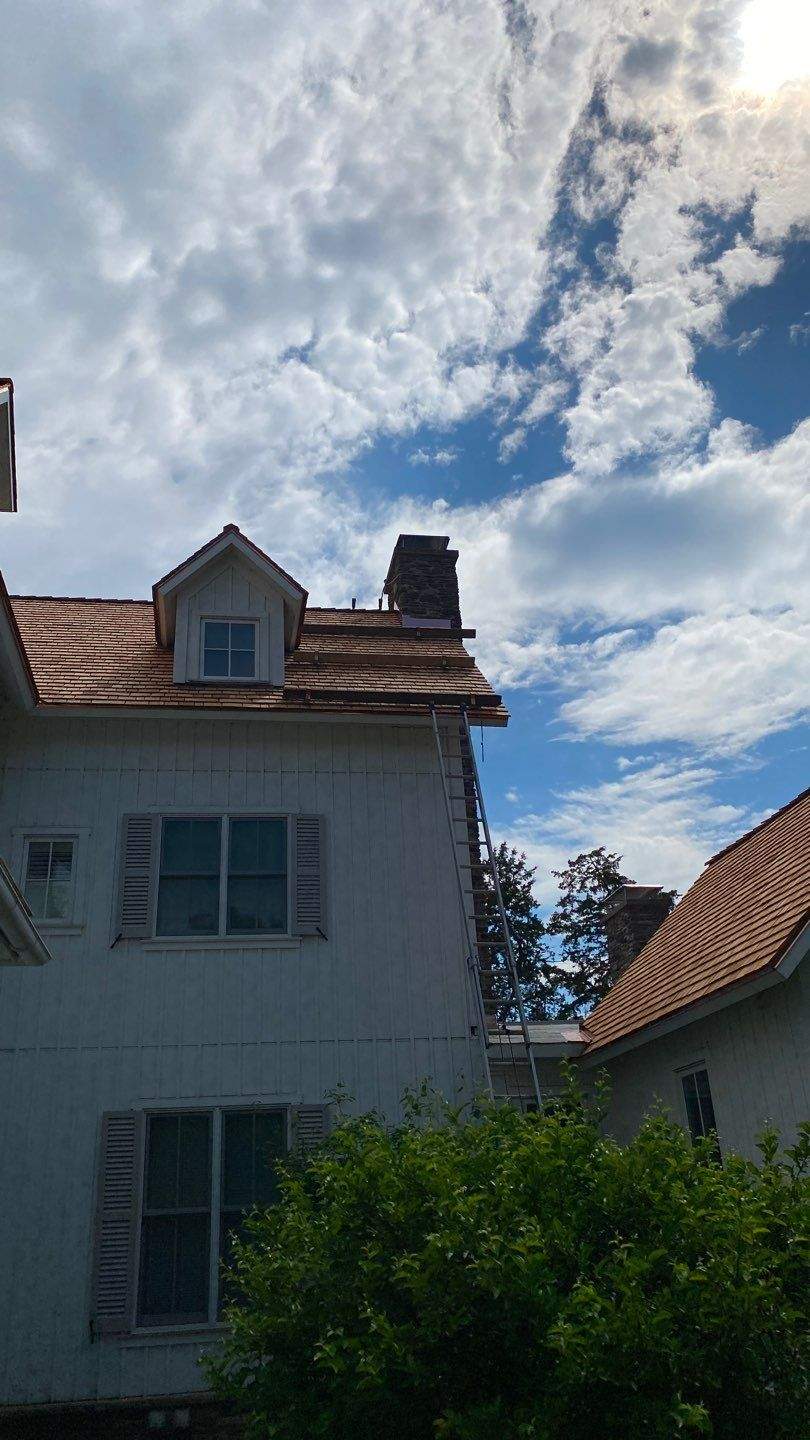 Cedar Shake Roof Replacement with Half Round Gutter Installation by Custom Installations