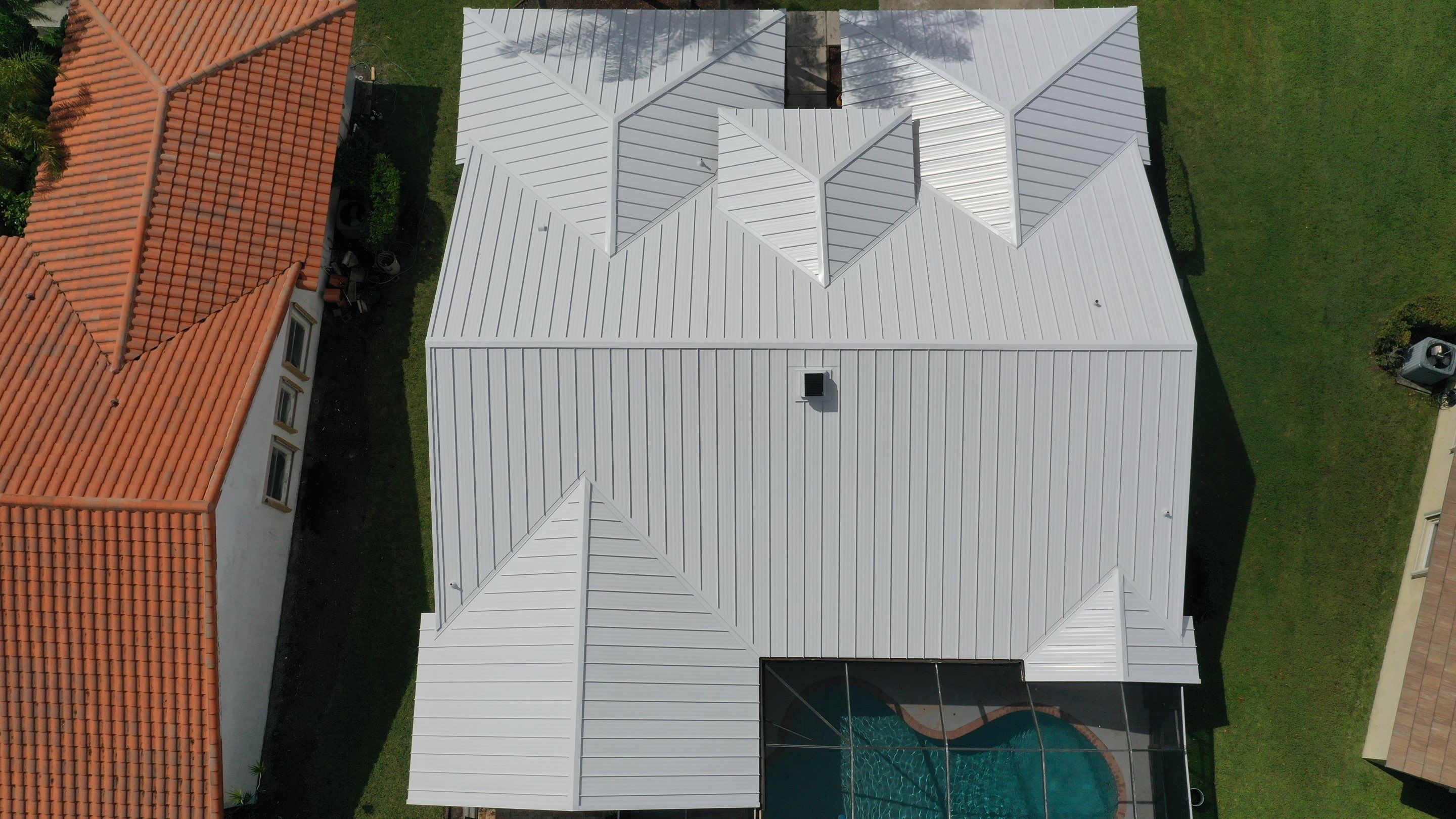 24ga 1.5" Mechanical Seam Regal White  by Total Roofing System The Metal Roof Experts