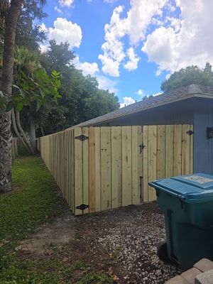 Wood Privacy Fence Installation with Double Gate in Port Charlotte