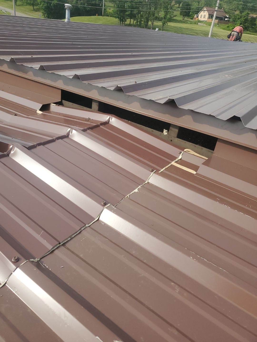 Commercial Roofing Installation using Metal by Rainstoppers Roofing