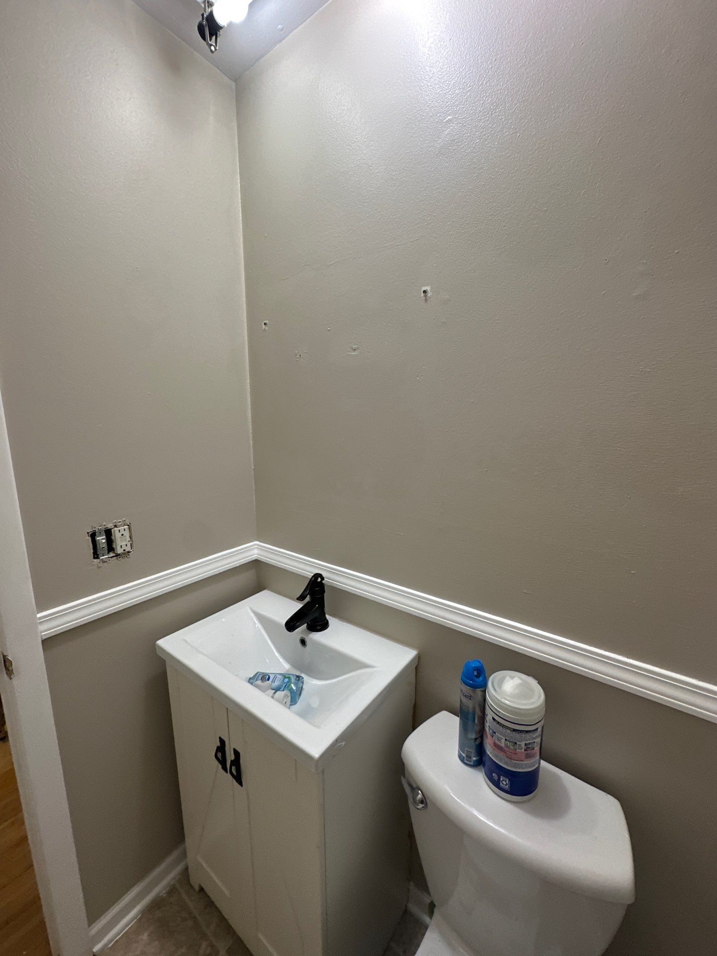 Modern Bathroom Interior Update Featuring White Wainscoting in Brown Deer by OCS Contracting Services
