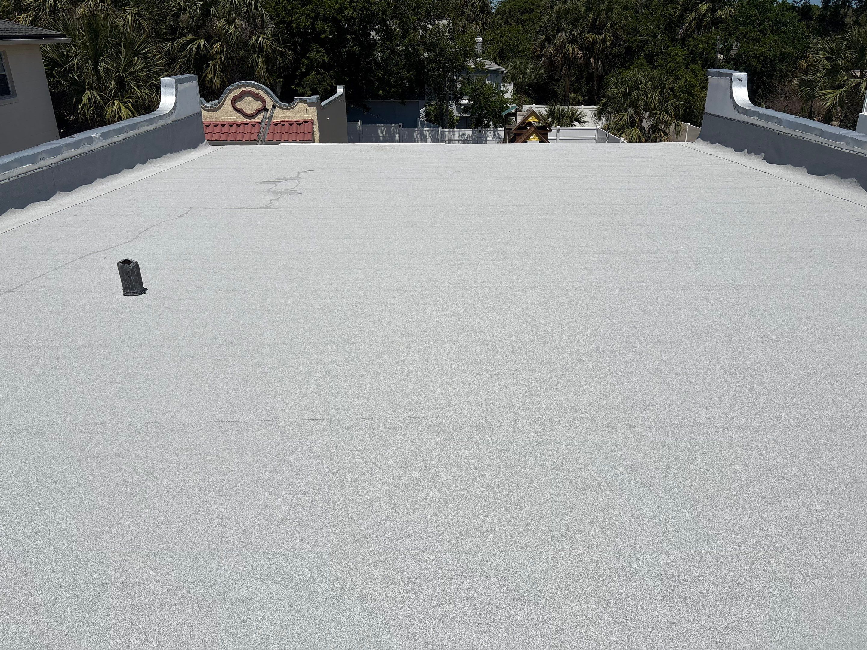 Flat Reroof Replacement Daytona Beach FL by Pinnacle Roofing Group
