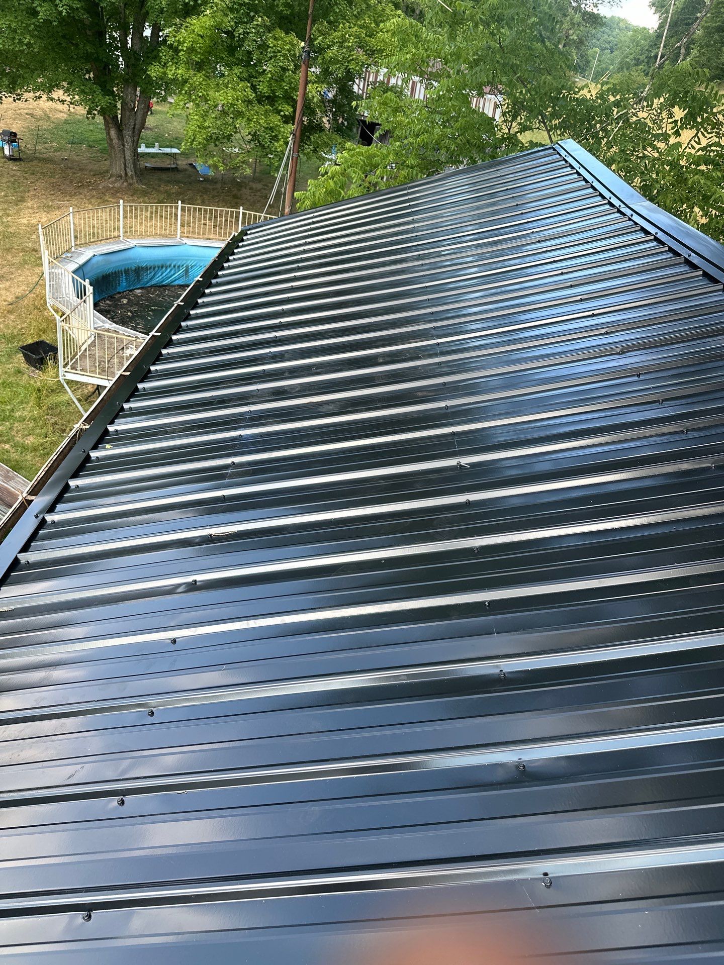 Residential Roofing Installation using Metal by Rainstoppers Roofing