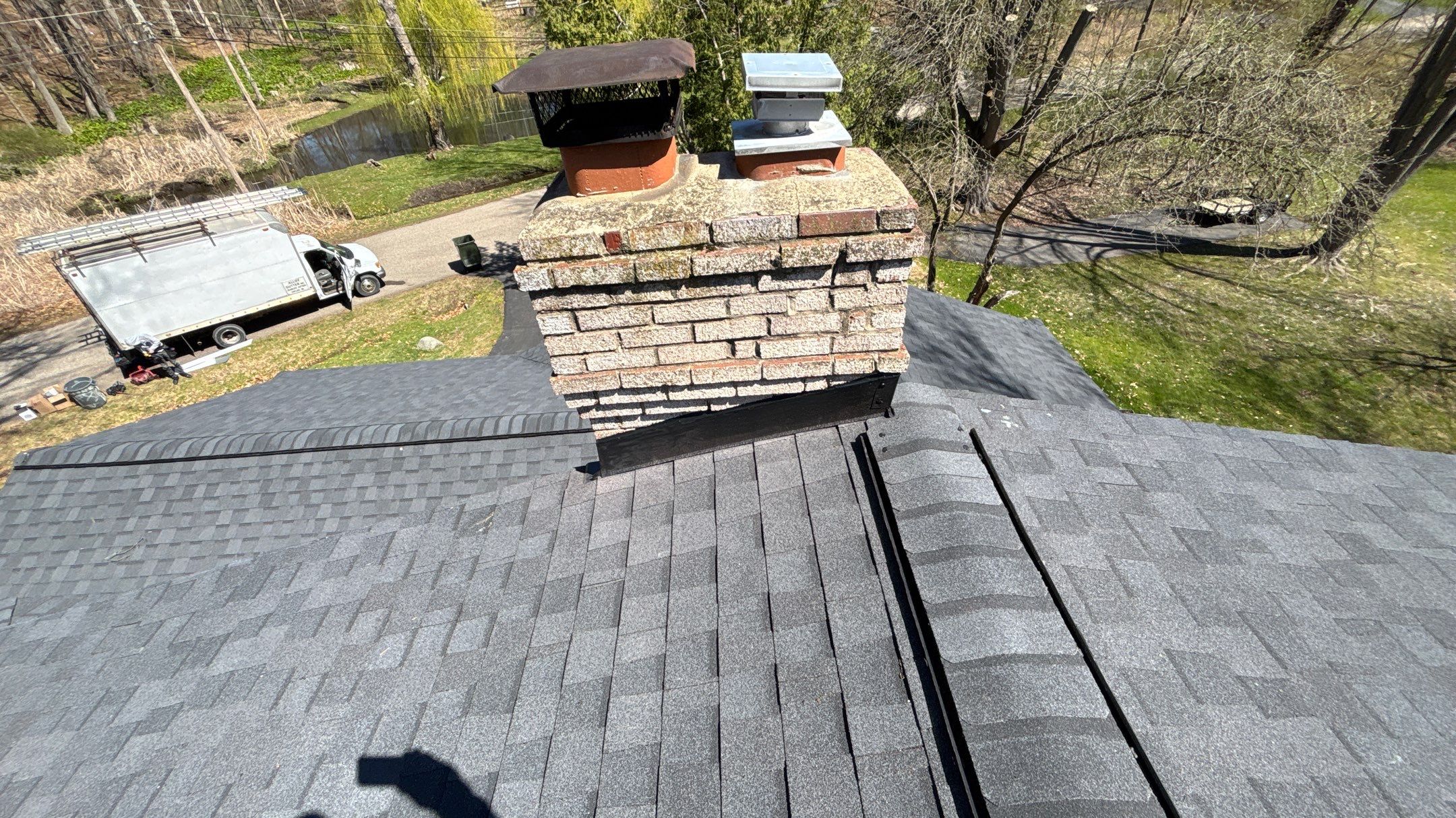 Roof Replacement using CertainTeed Landmark Moire Black by 180 Contractors