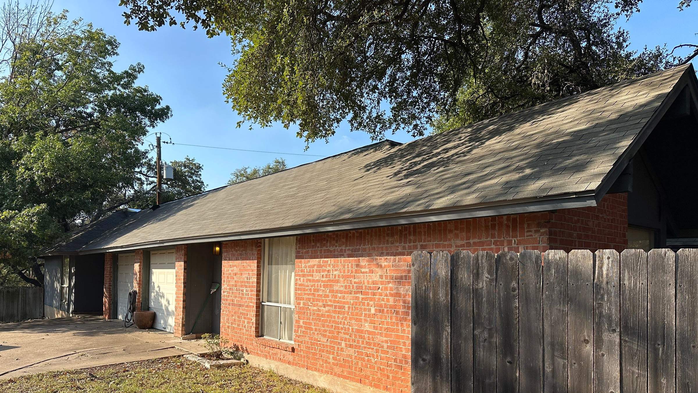 Driftwood Shingles and Low-Slope Roofing in Austin by Skywall Construction LLC