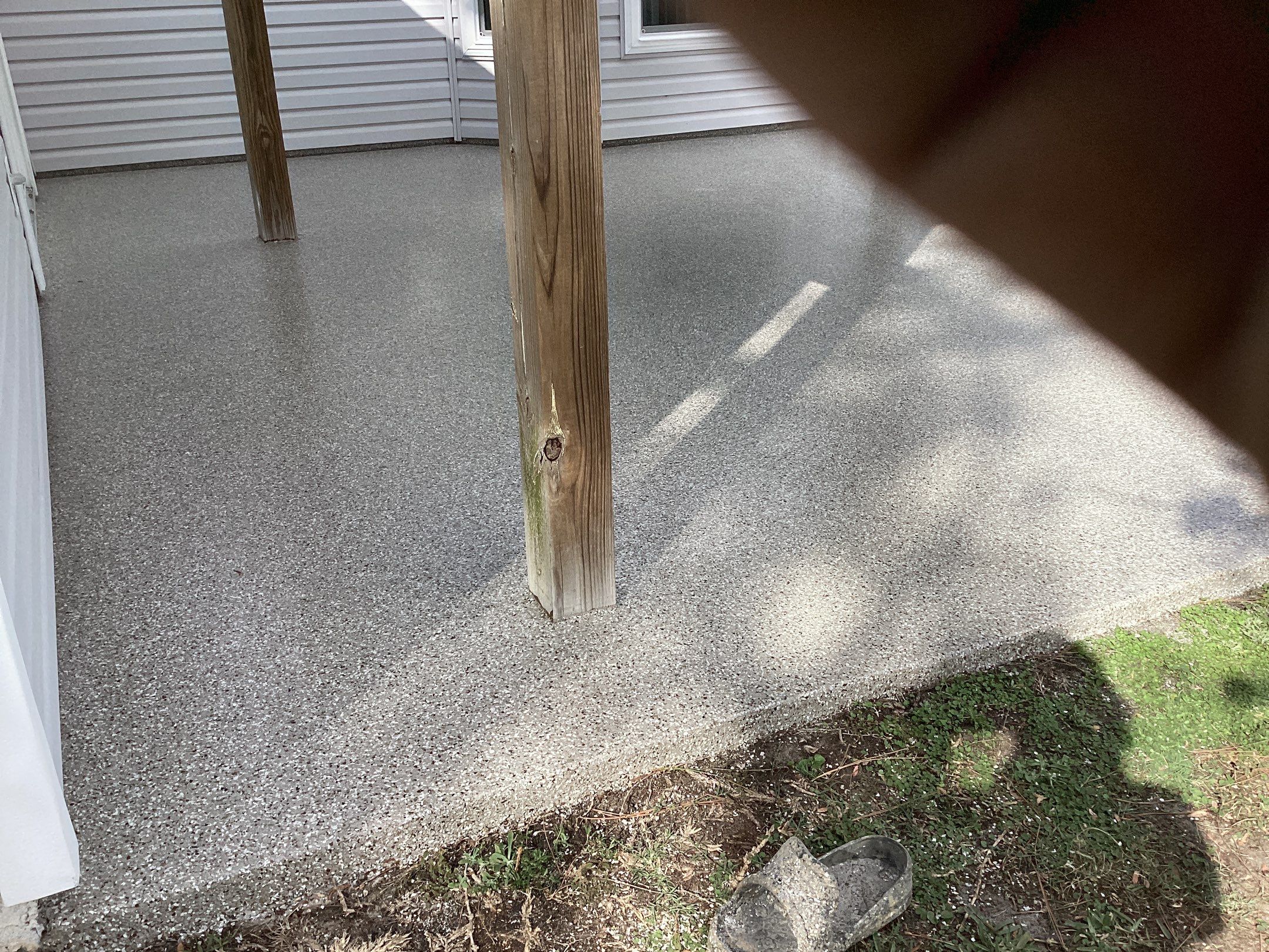Patio using Pebble Beach by Amvet concrete coatings llc