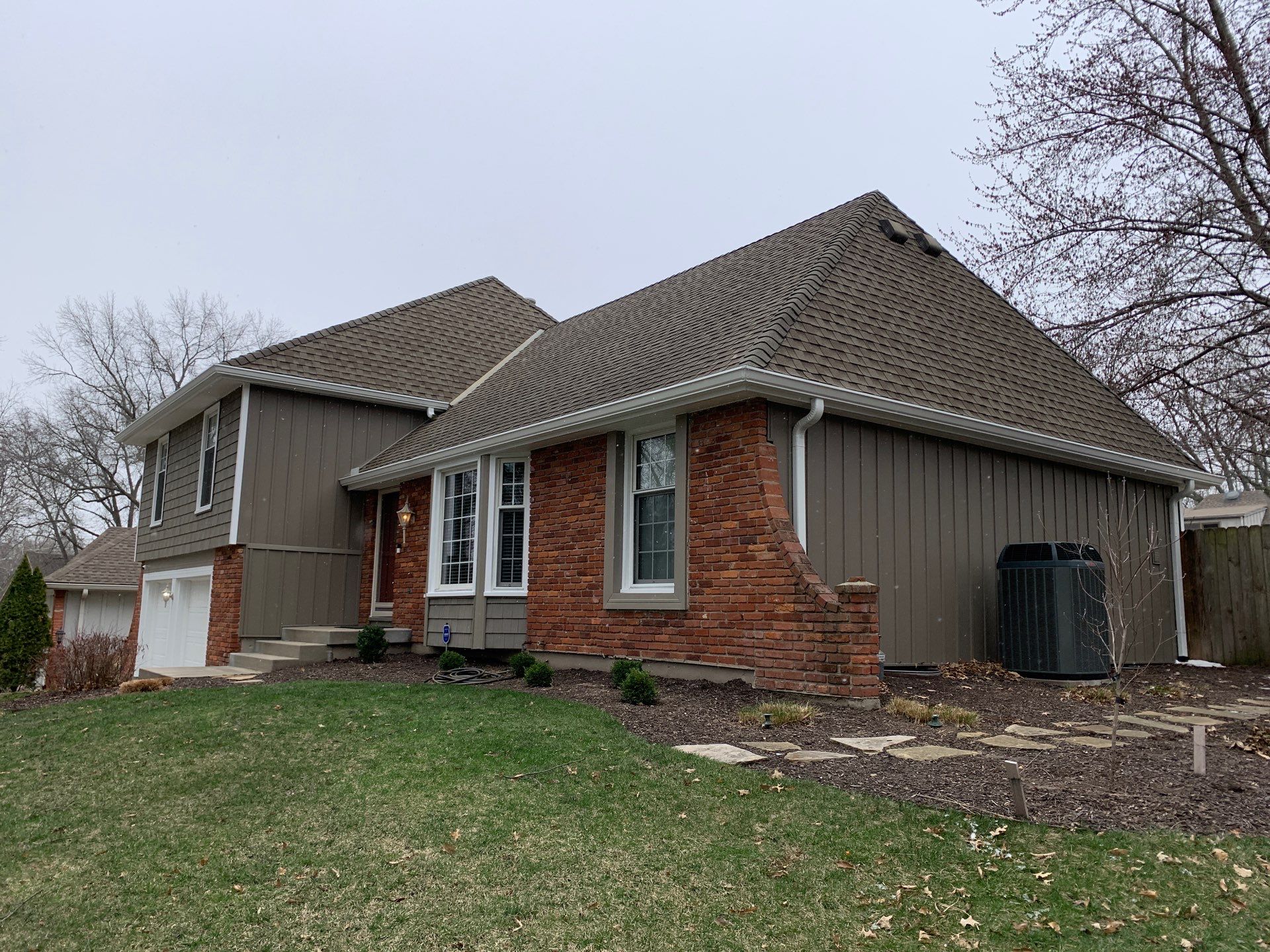 Complete Kansas City Exterior Remodel With IKO Roofing and Craneboard Siding by EEC Windows, Siding & Roofing