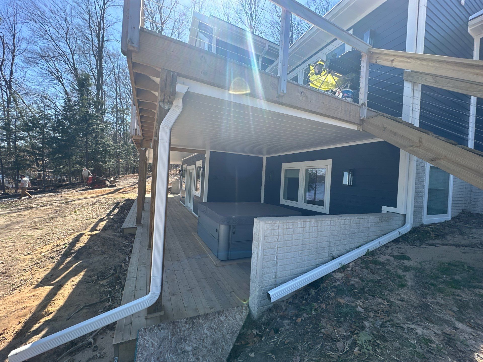 Gutter Helmet and Underdecking Installation for Alden Lakefront Home by Rainbow Seamless Systems