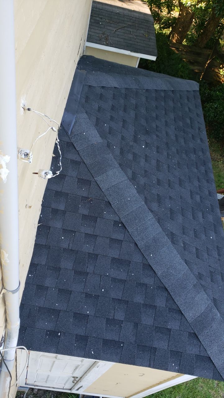Residential Roofing Installation using Roof Replacement by American Roofing & Construction LLC