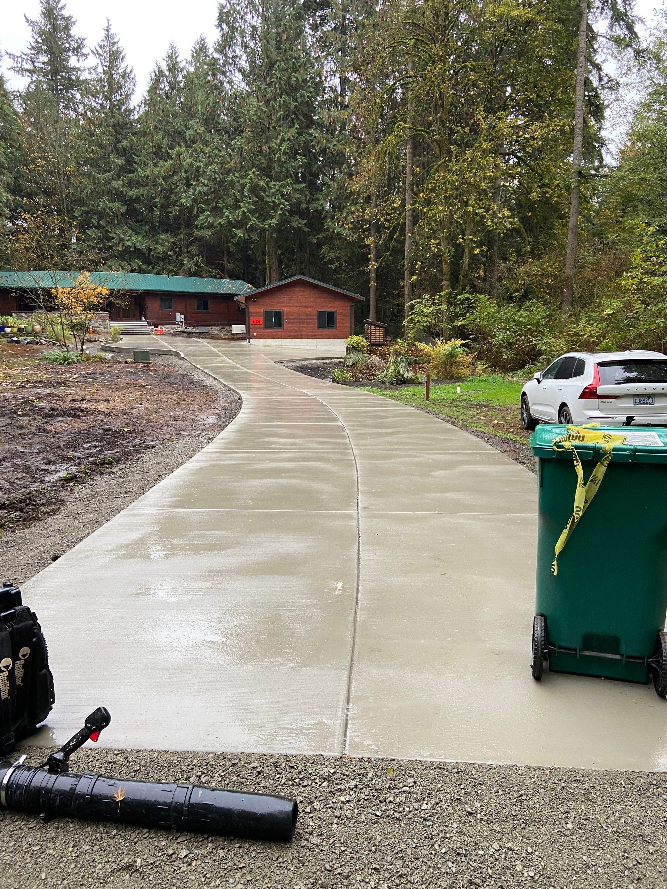 Pia | Custom Concrete Driveway, Walkway & Floating Steps by Jireh Asphalt & Concrete Inc 