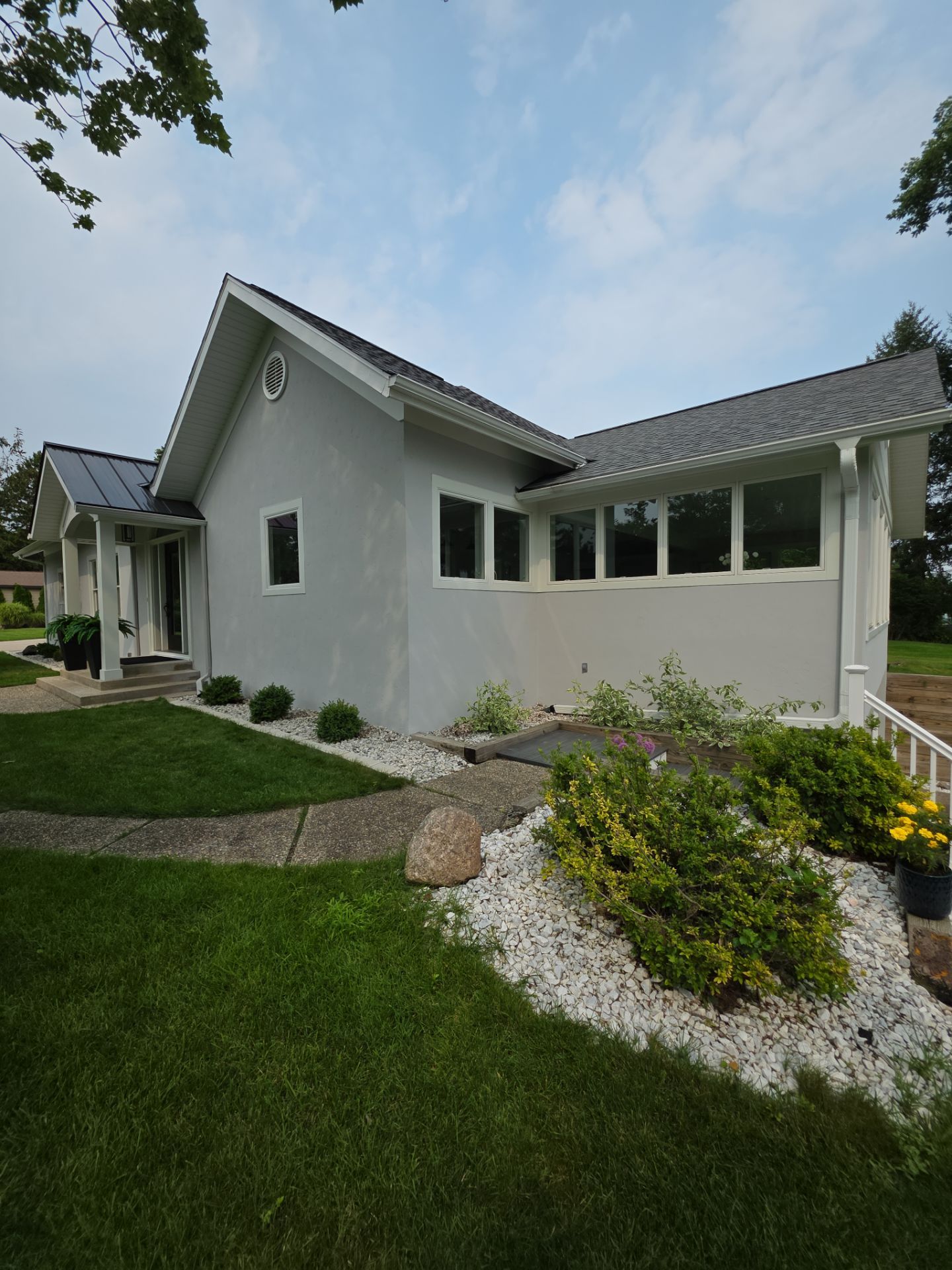 Norton Shores Residential Stucco Repair and Exterior Painting Refresh by Gordon Painting