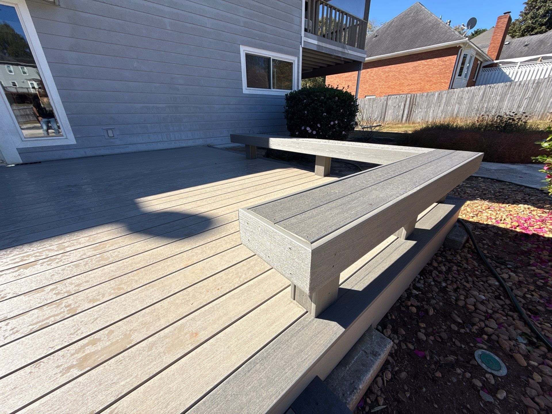 Custom Composite Deck with Integrated Seating in Roswell by Swift Home Renovations