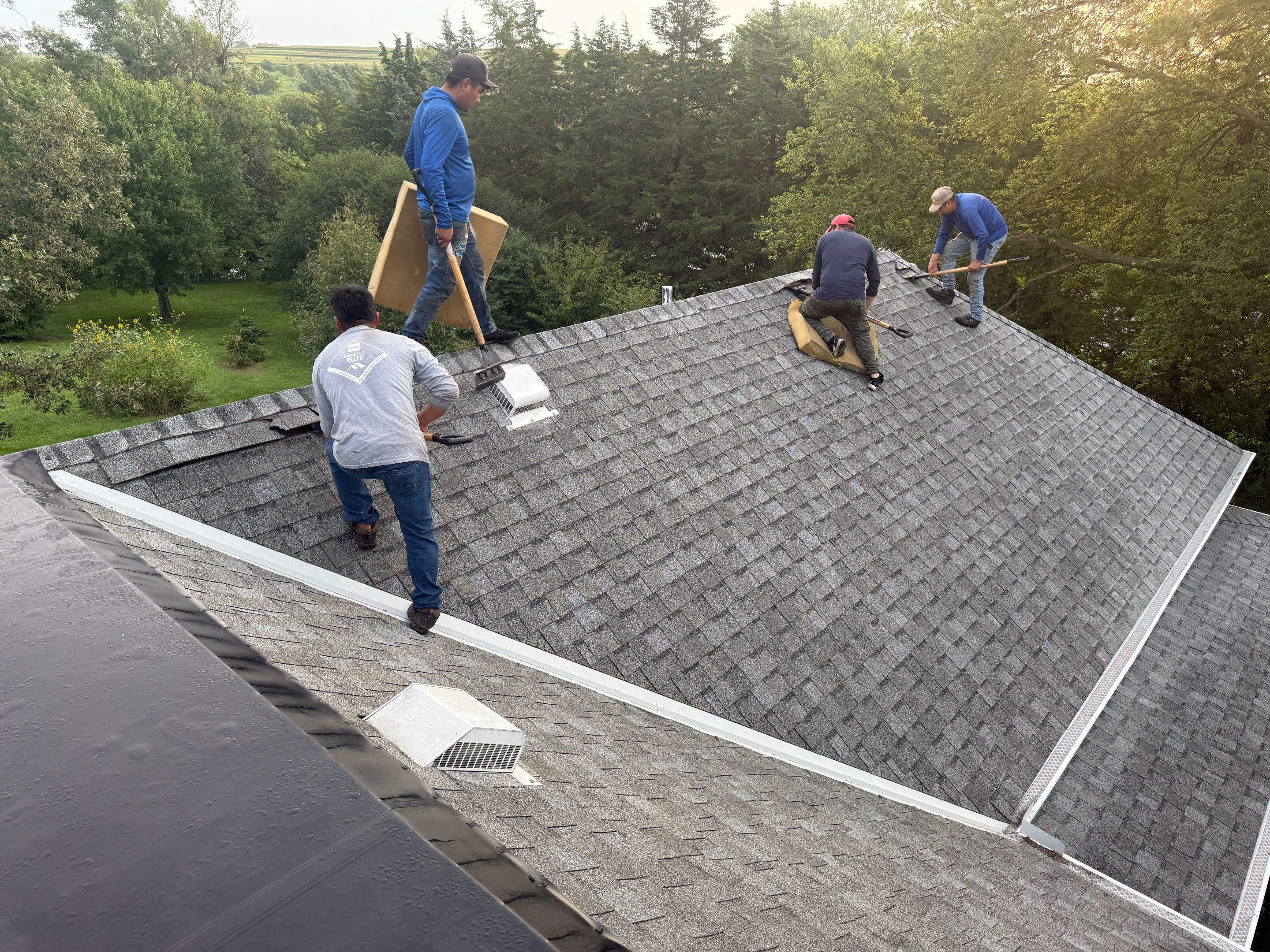 Asphalt Shingle and EPDM Membrane Roof Installation in Mineola by Star Home