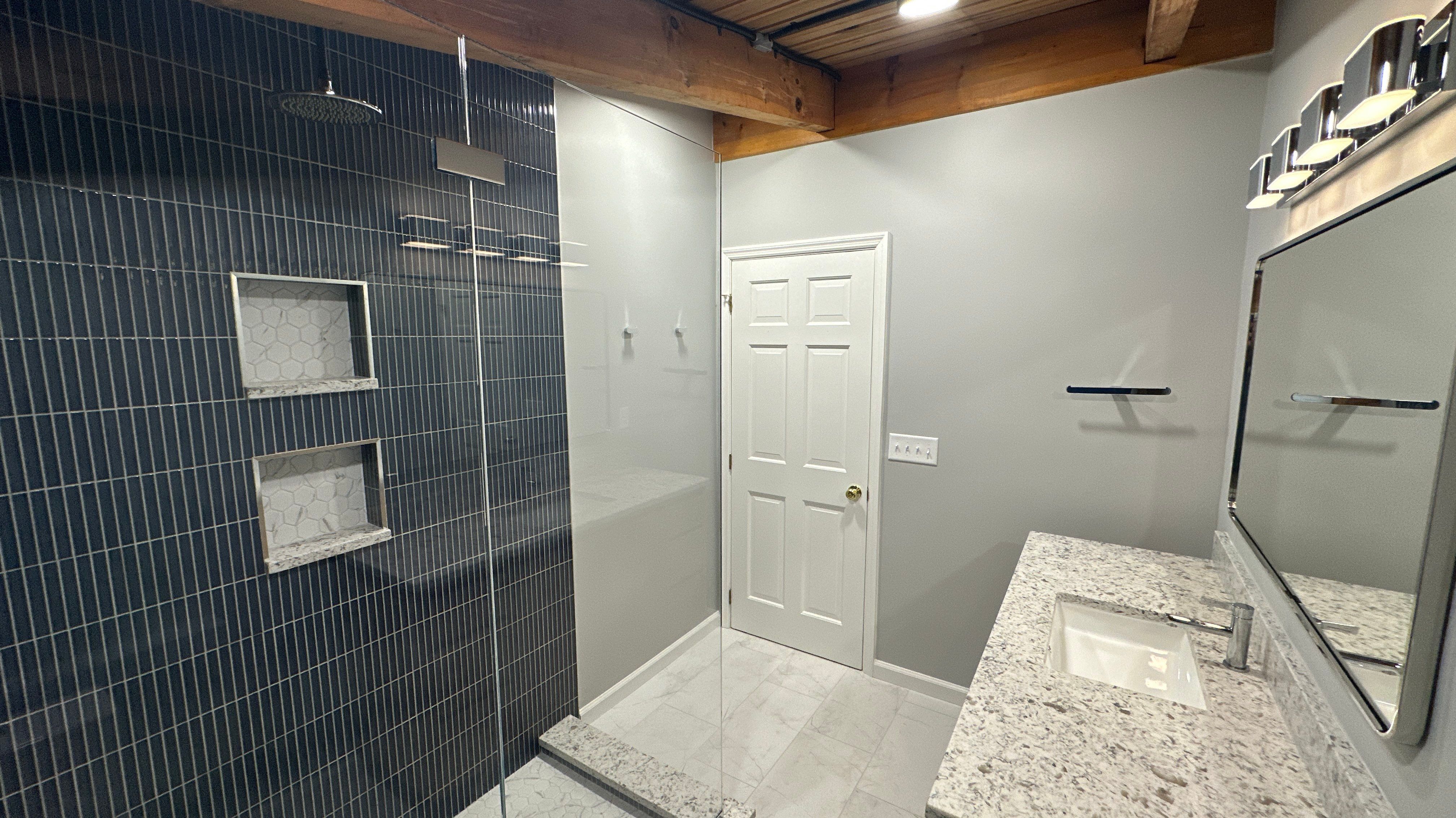 Brandt Double Bathroom Remodel by Integrity Tile and Home LLC