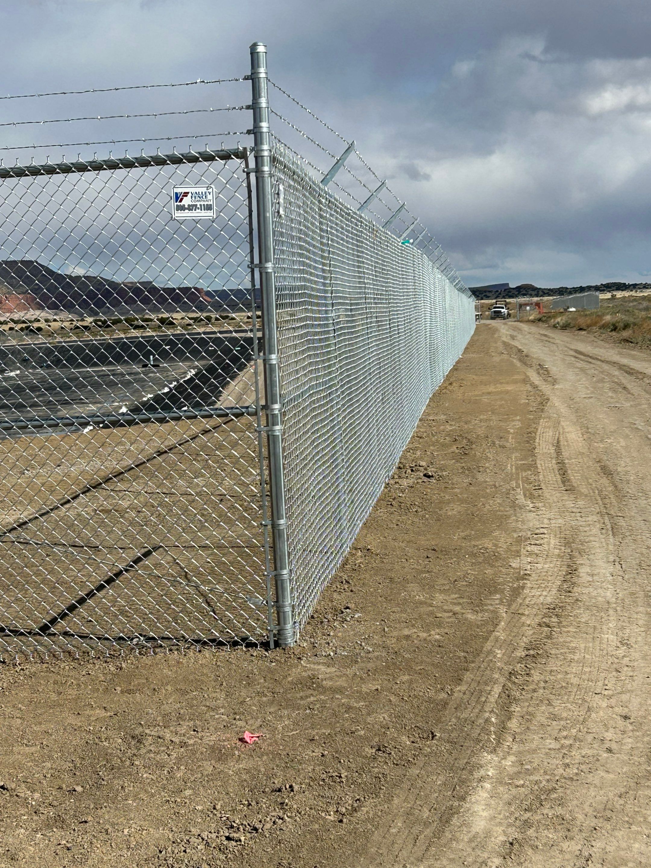 Commercial  using 8'+1' 9ga chain link by Valley Fence Company