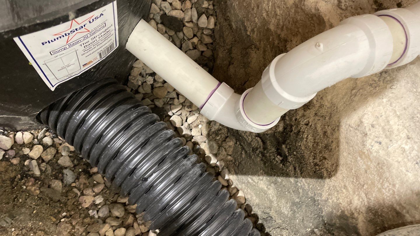 Drain tile & a sump pump for Ruth by Waterproofing Northeast