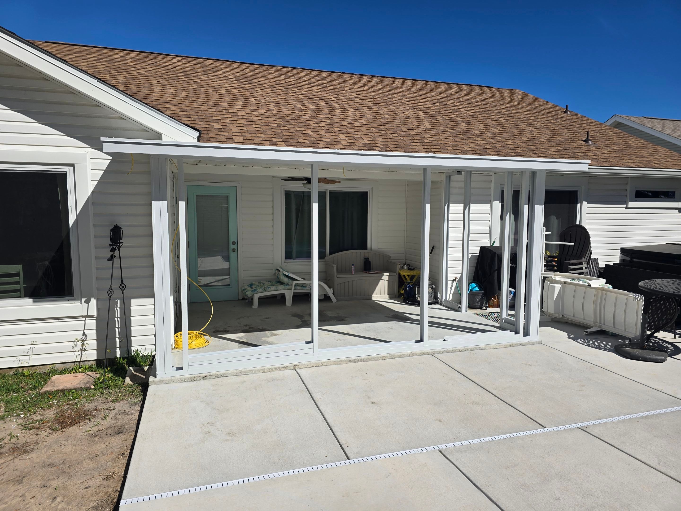 Poolside Glass Room in Gulf Breeze by Titan Sunrooms