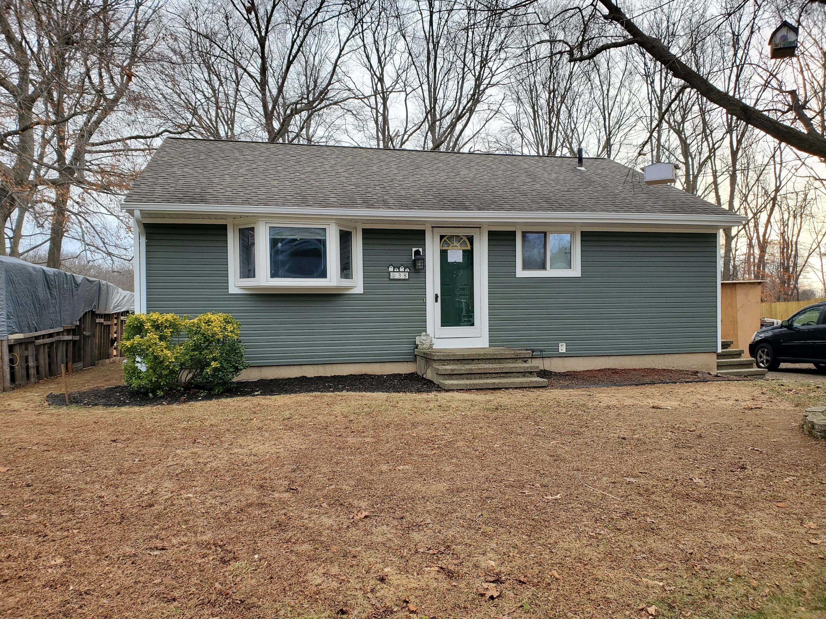 Siding Installation using Certainteed Mainstreet Forest Green by A Plus Exterior