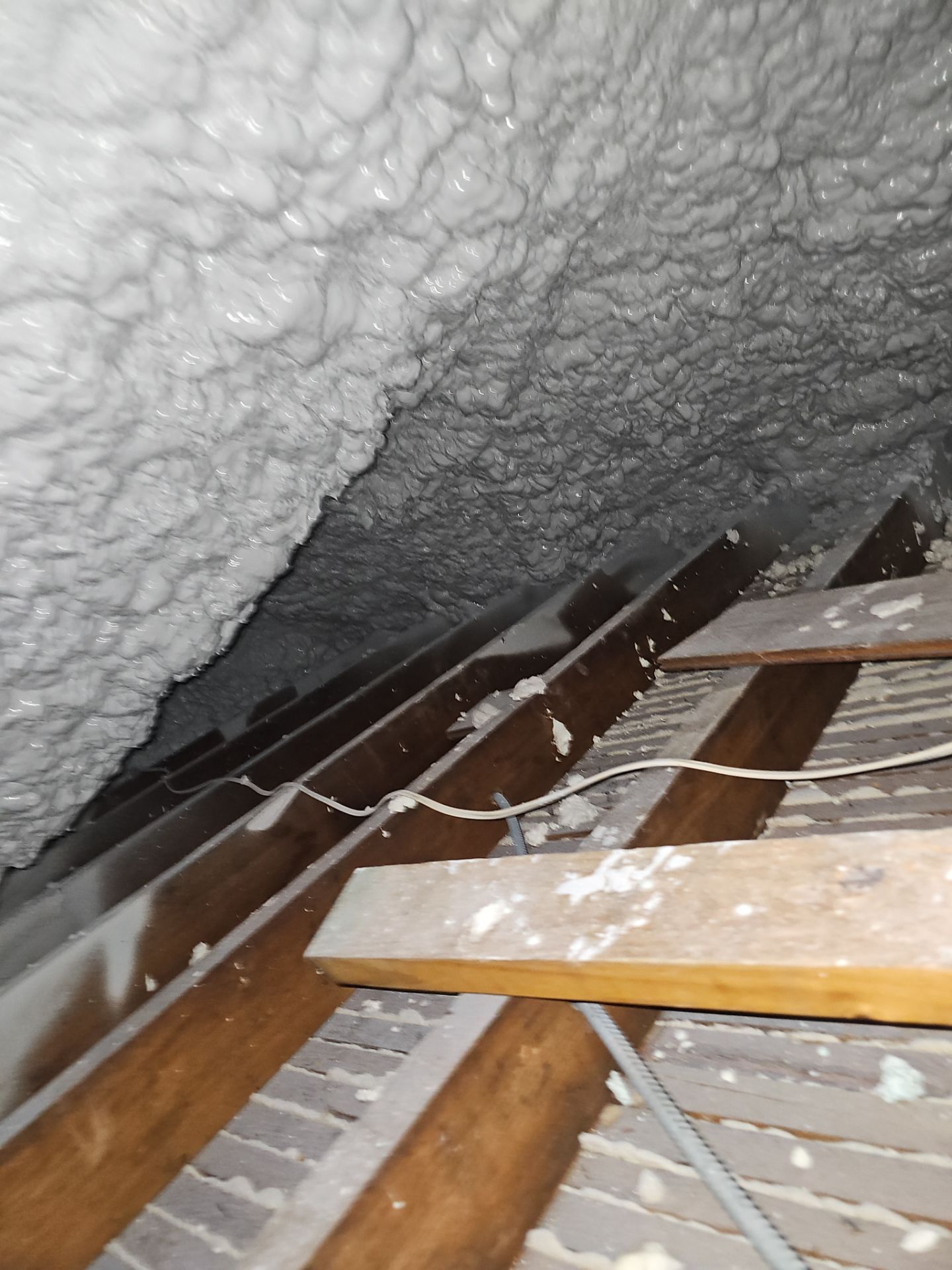 Attic Insulation using open cell spray foam by NYS Foam & Energy