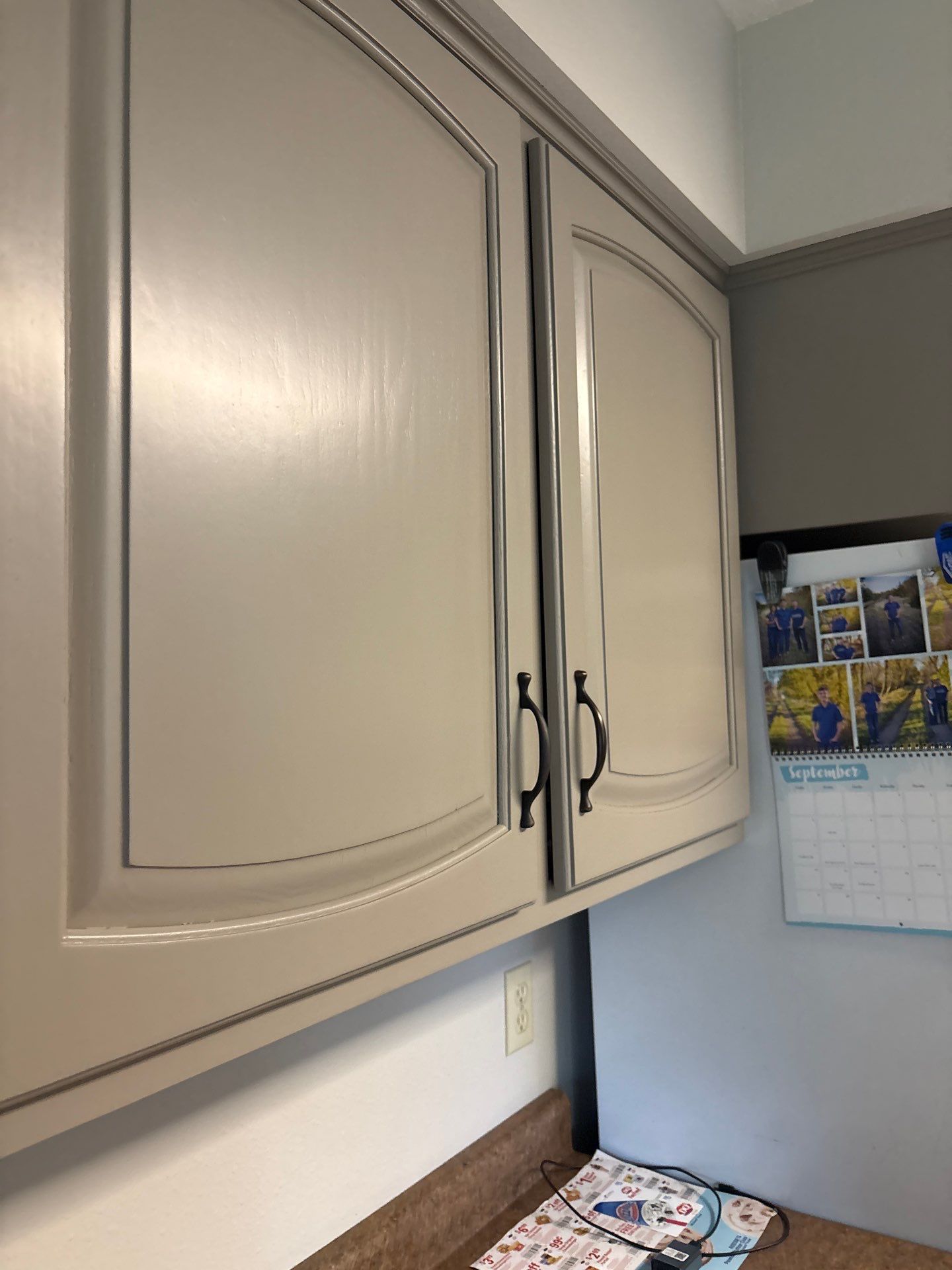 Kitchen Cabinet Painting and Hardware Update in Sioux Falls by Select Painting, Coatings & Garage Cabinets