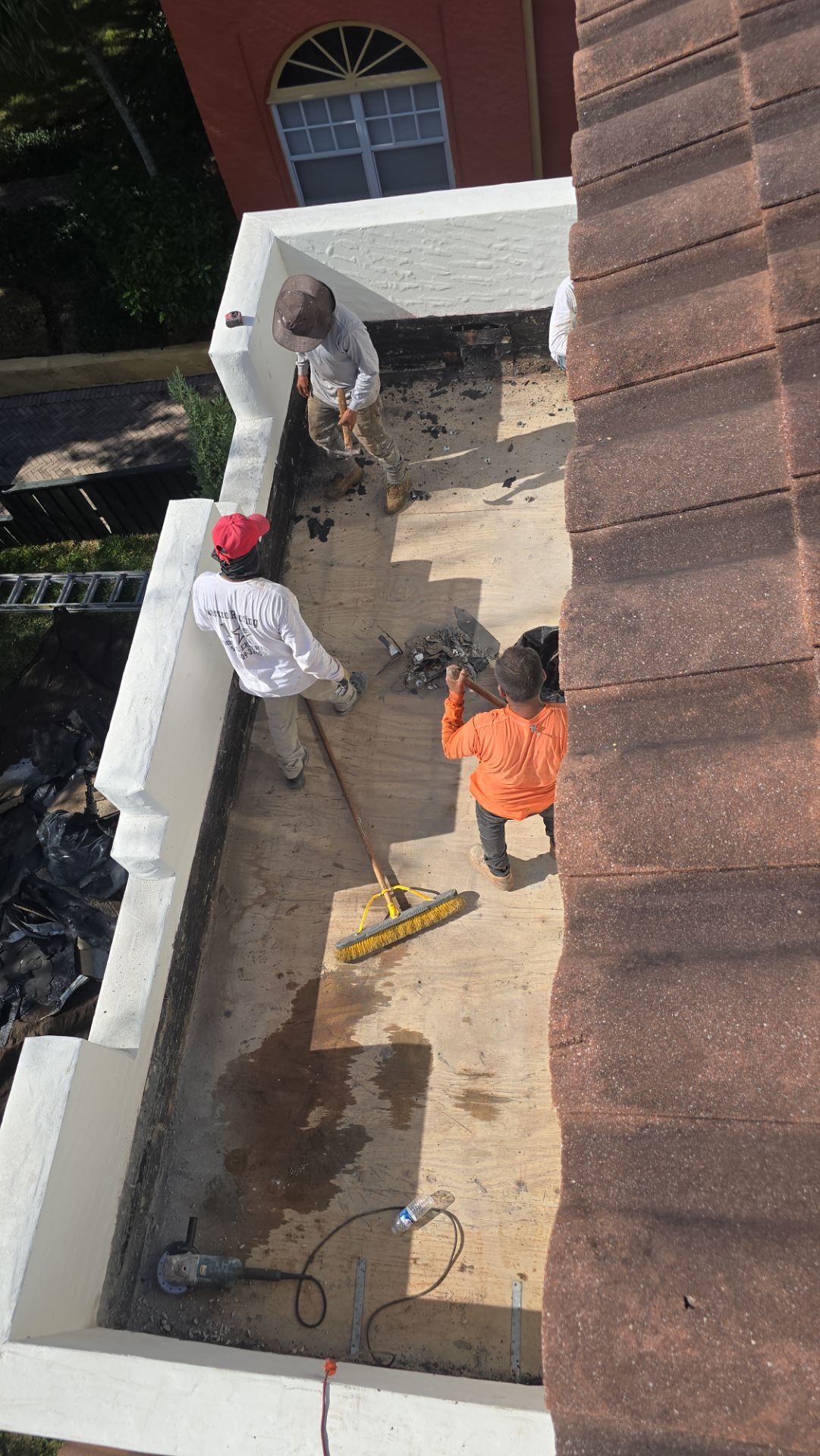 West Palm Beach Roof Restoration and Travertine Paver Driveway Installation by Aastro Roofing