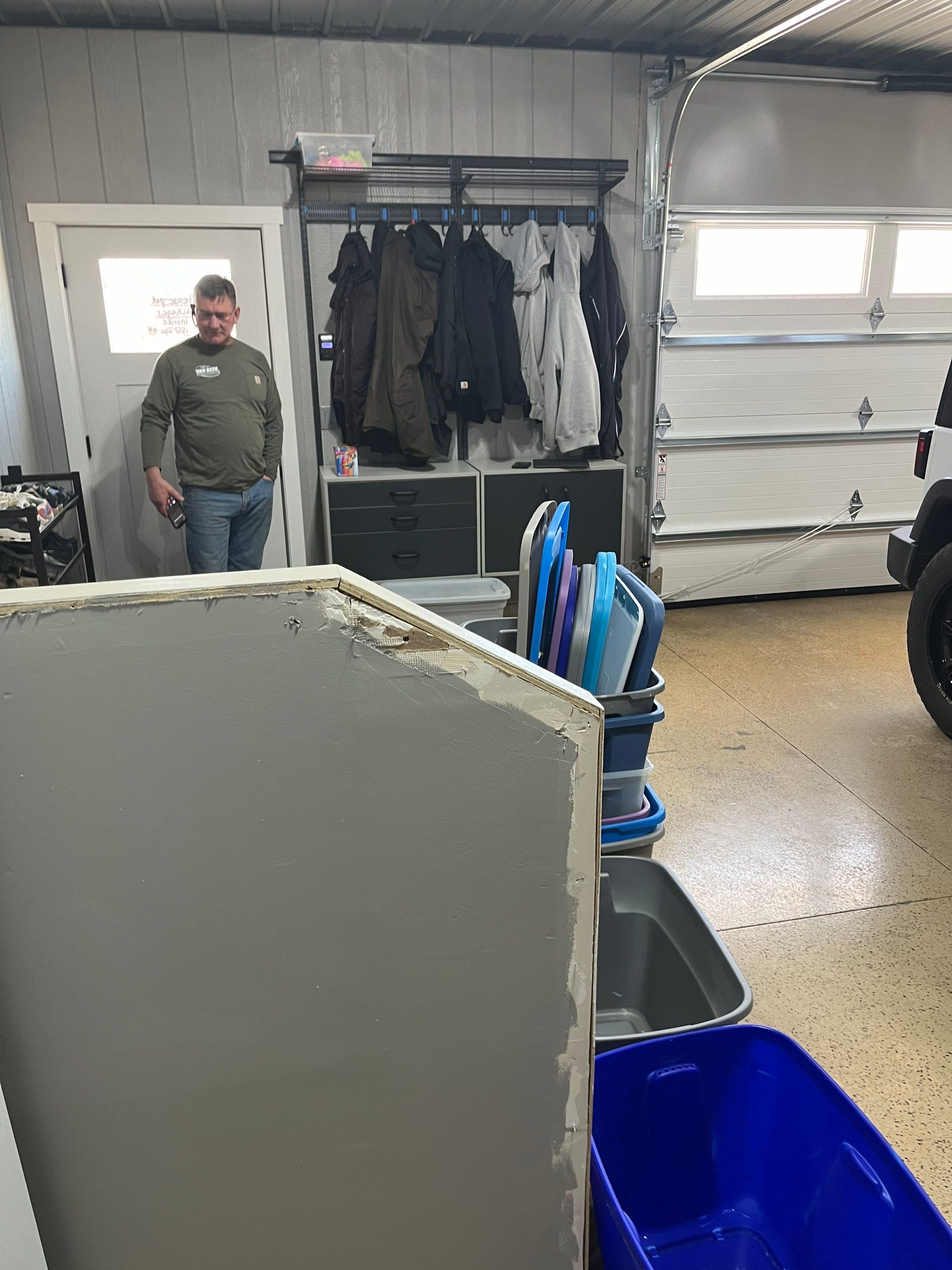 High-Gloss Grey Epoxy Floor Coating for Inwood Garage by Select Painting, Coatings & Garage Cabinets