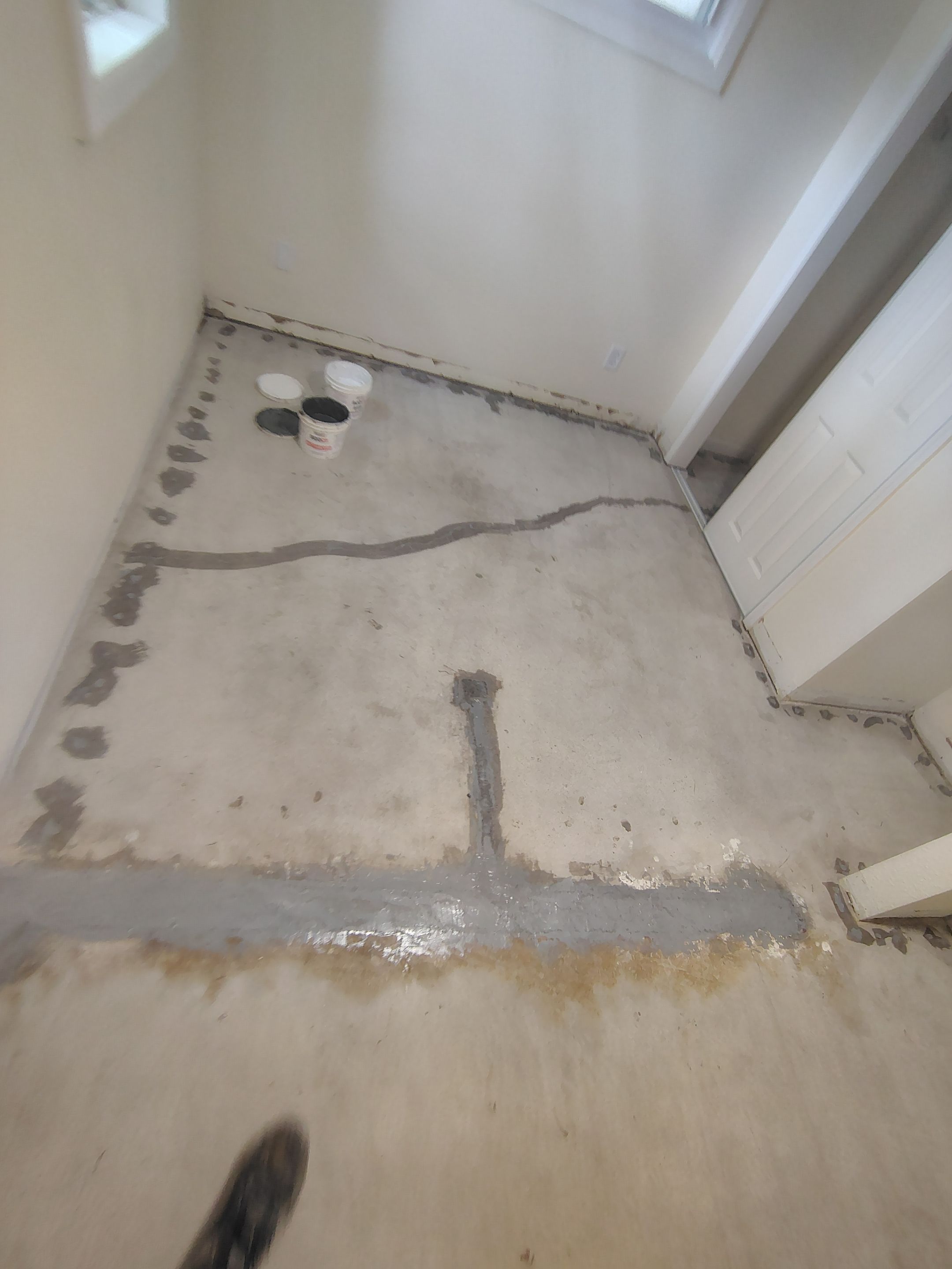 Comprehensive Basement Concrete Floor Coating and Crack Repair in Sioux Falls by Select Painting, Coatings & Garage Cabinets