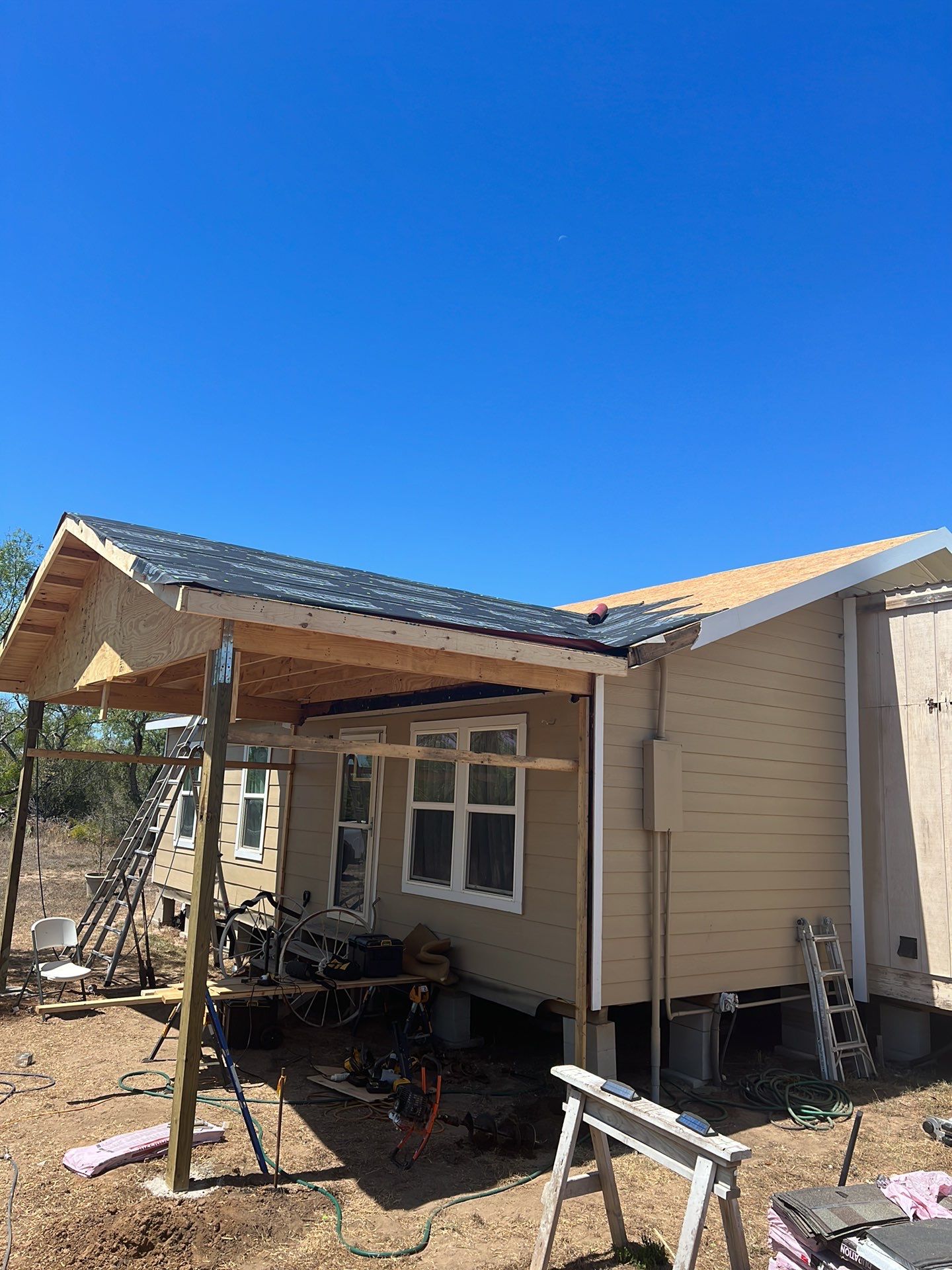 Front Porch Sitt'n by Bayfront Roofing and Construction
