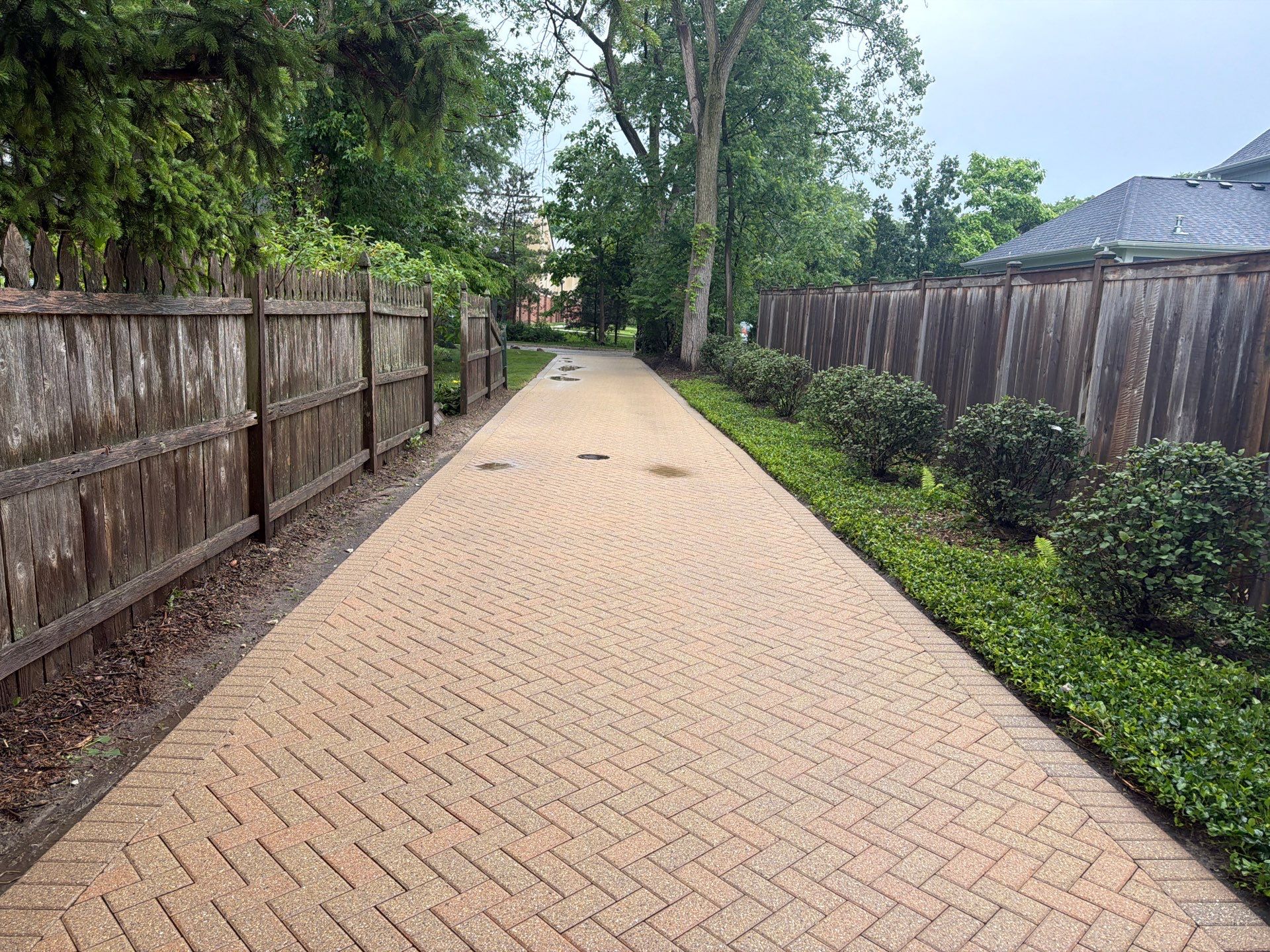 Brick paver repair, cleaning and sealing by Northern Power Washing LLC.