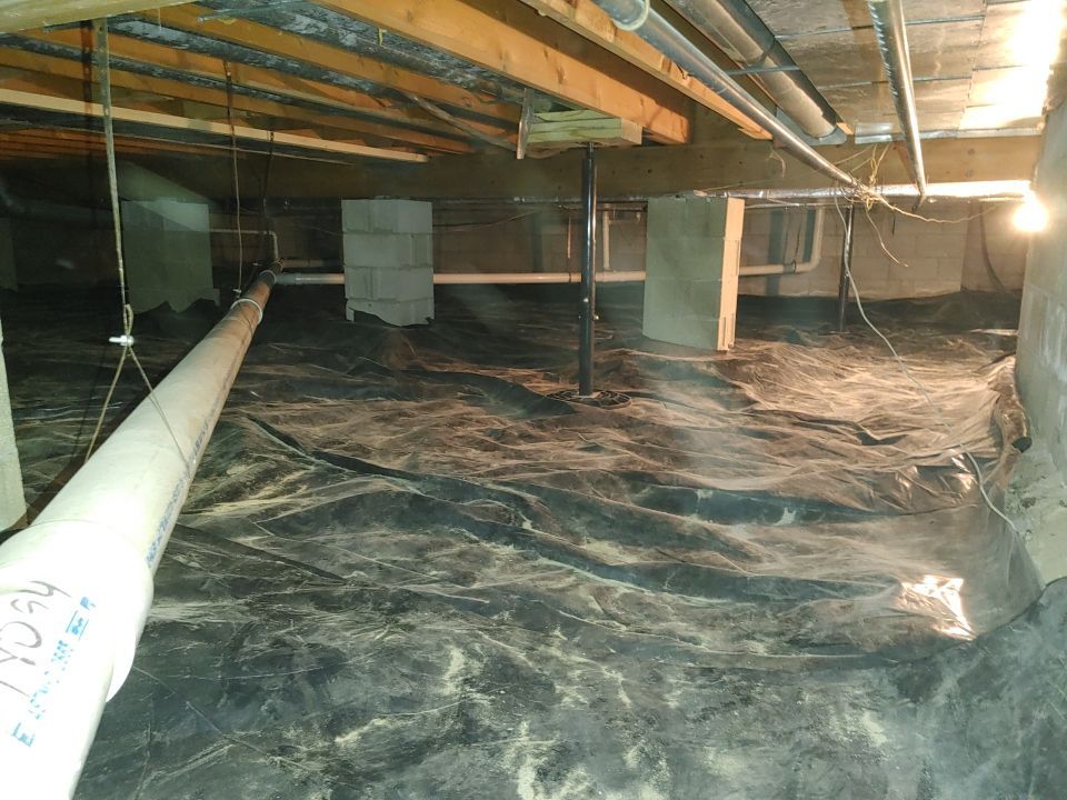 Crawl space encapsulation and Waterproofing using Structural Wood and Steel Reinforcements by Toledo Basement Repair 