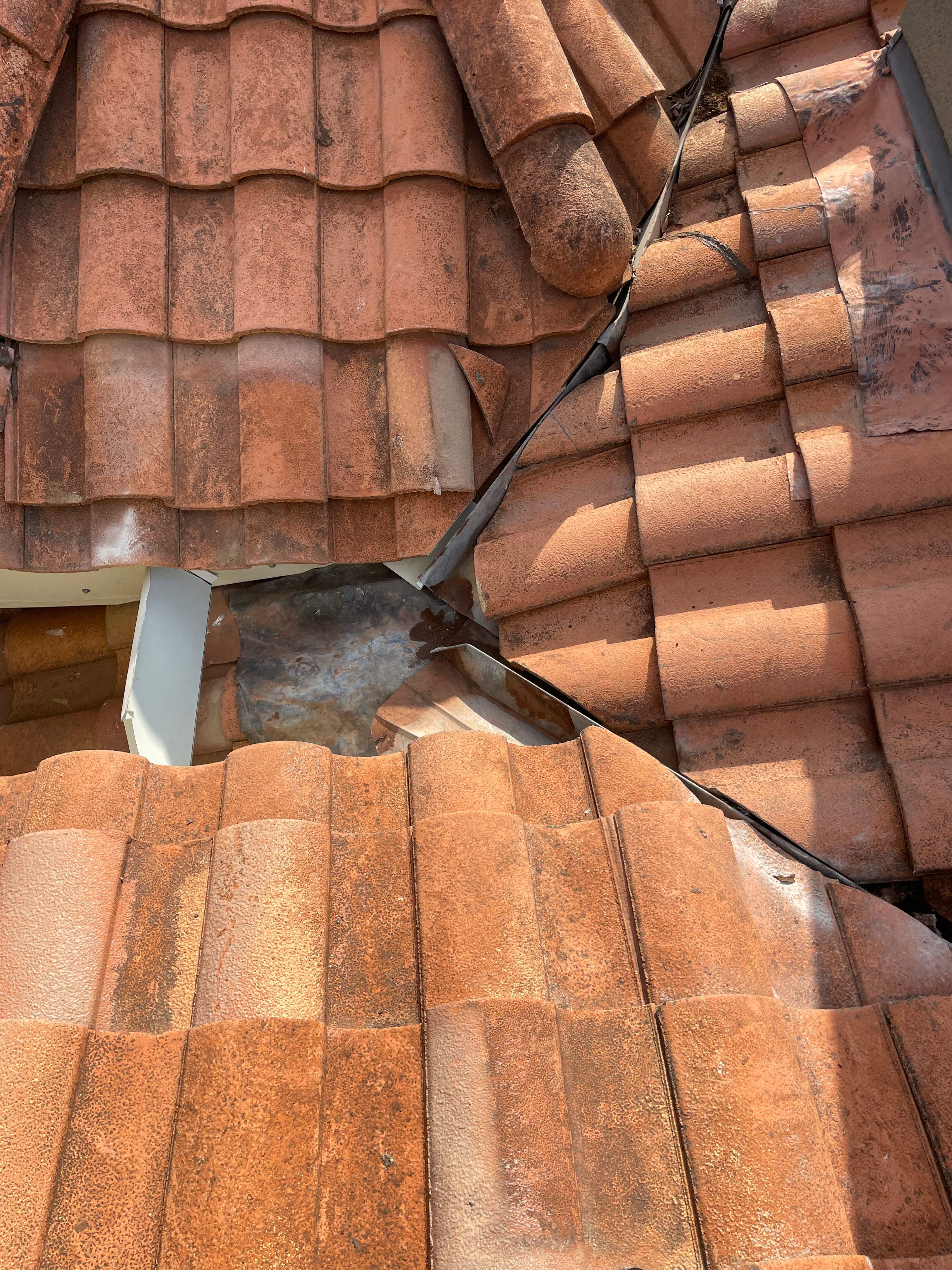 Dead Valley Repair on a Tile Roof  by Associates Roofing Unlimited 
