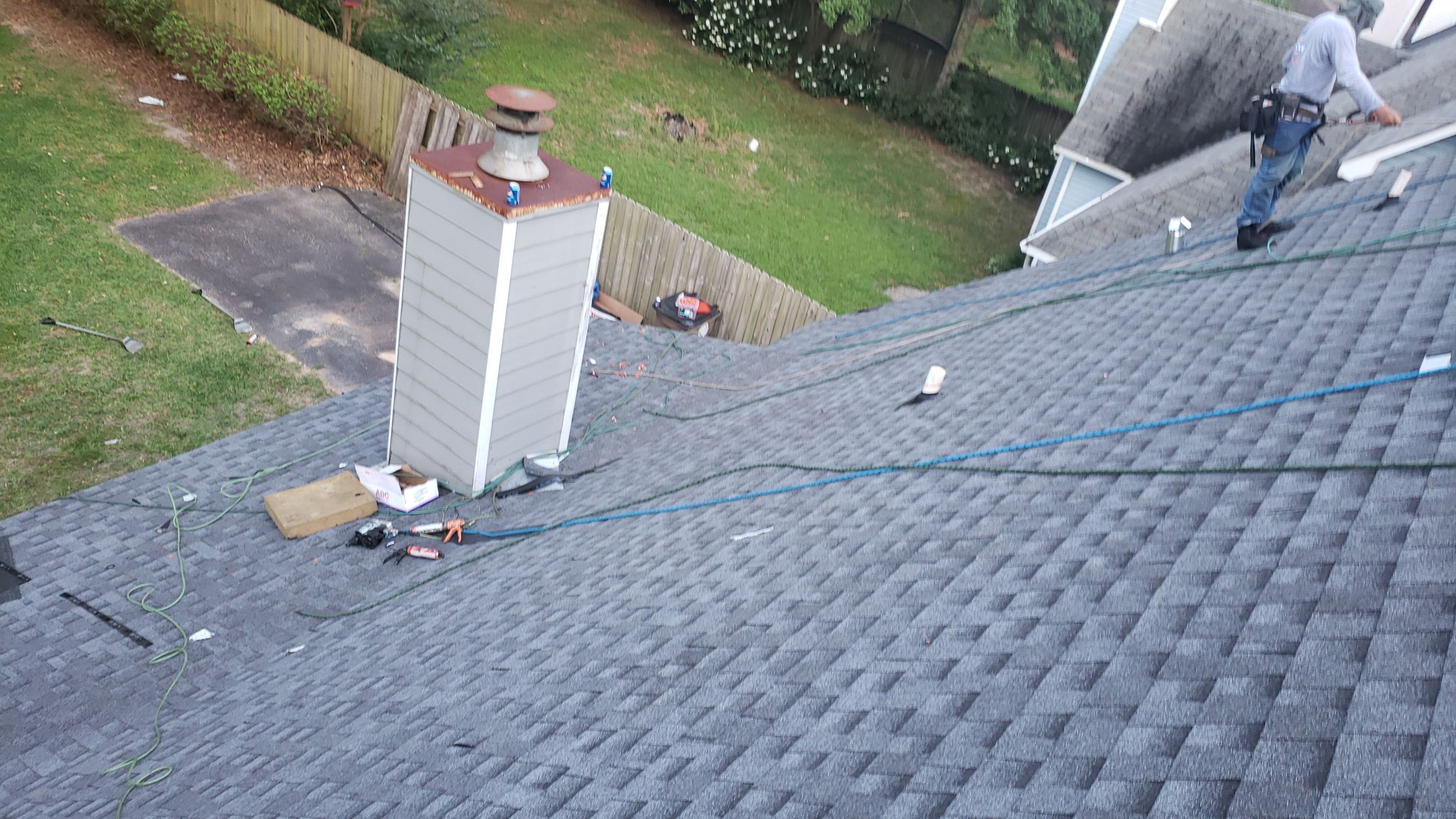 Residential Roofing Installation using Roof Replacement by American Roofing & Construction LLC