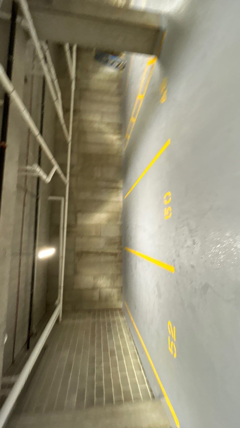 Parking garage using Hot water by Northern Power Washing LLC.